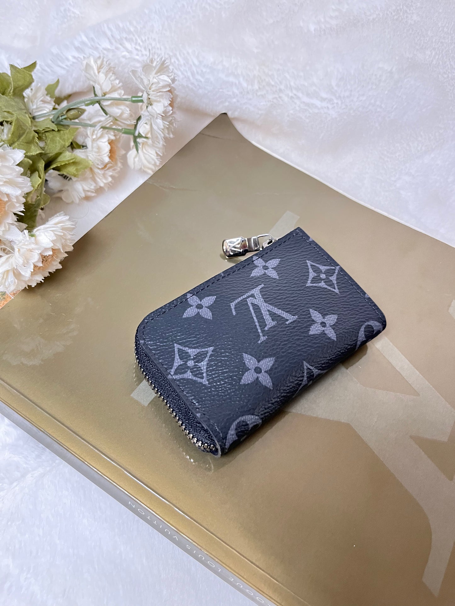 Authentic pre-owned Louis Vuitton Eclipse Porte Monnaie Jour coin purse