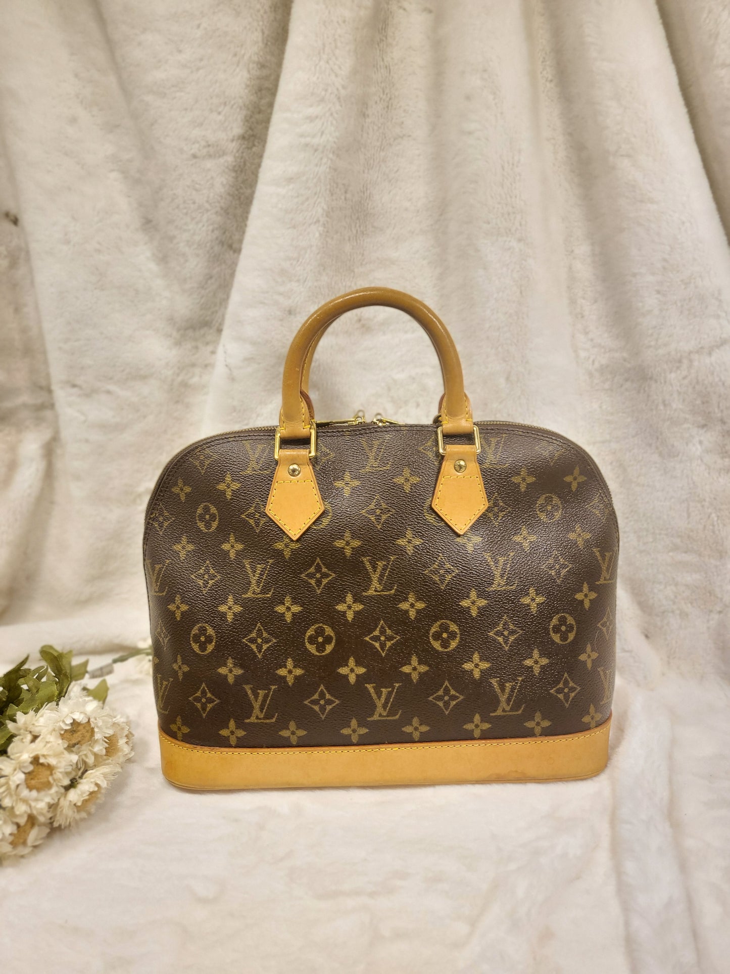 Authentic pre-owned Louis Vuitton Alma pm