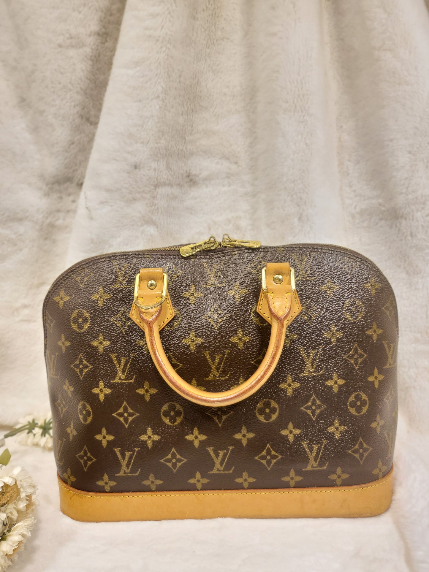 Authentic pre-owned Louis Vuitton Alma pm