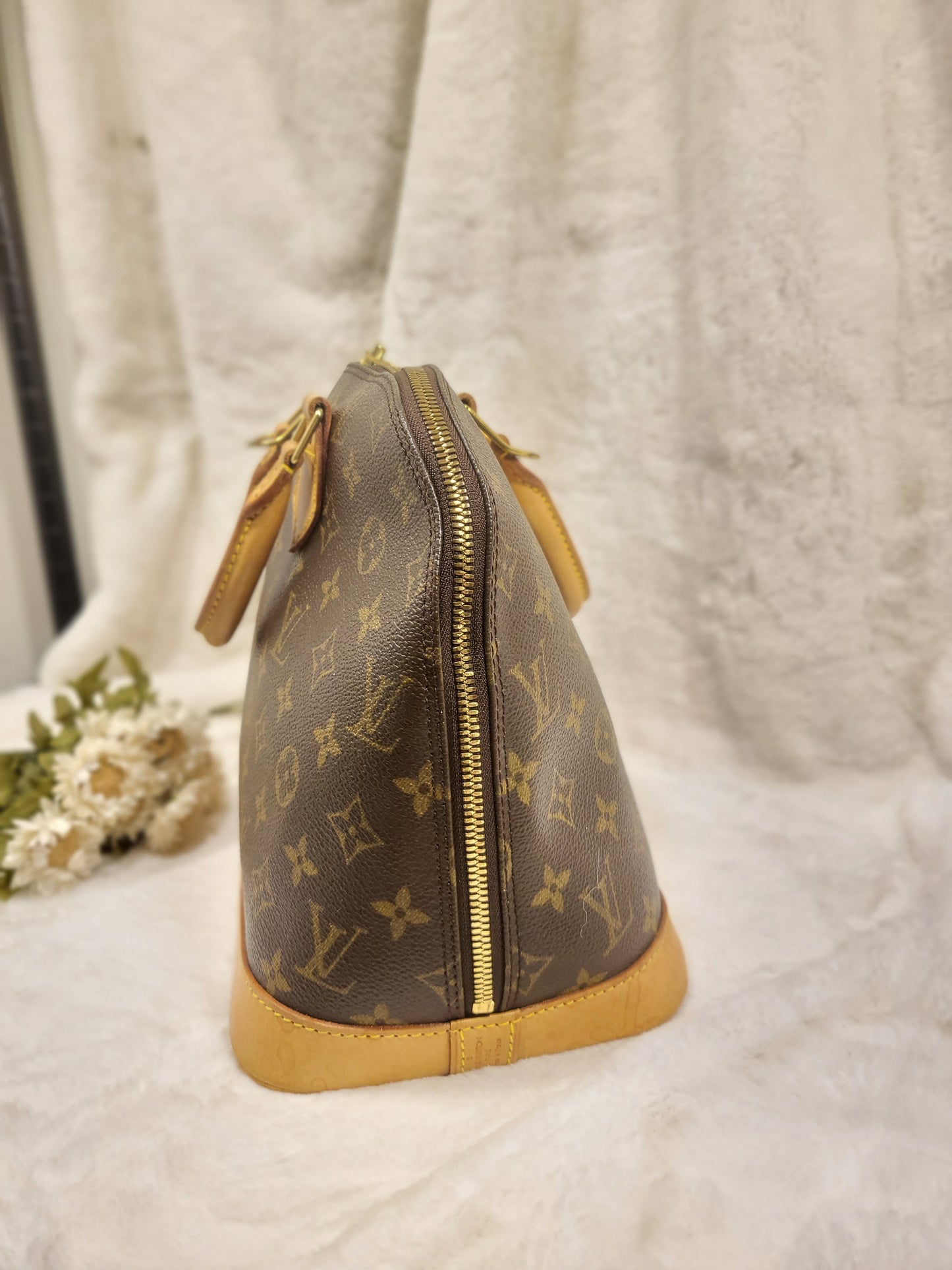 Authentic pre-owned Louis Vuitton Alma pm