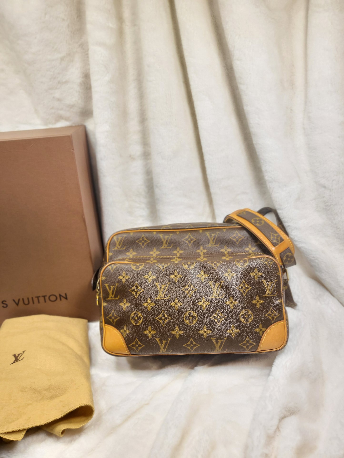 Authentic pre-owned Louis Vuitton Nile pm crossbody shoulder bag