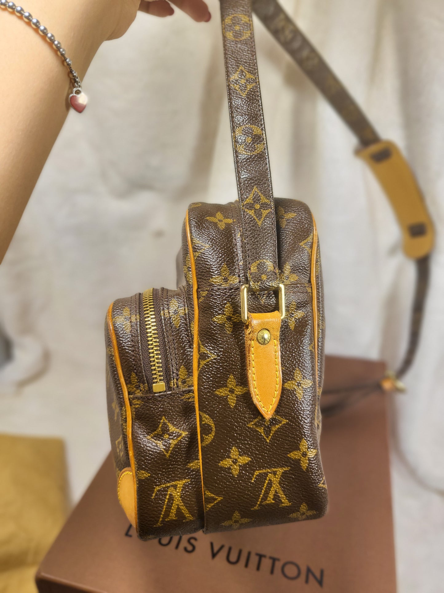 Authentic pre-owned Louis Vuitton Nile pm crossbody shoulder bag