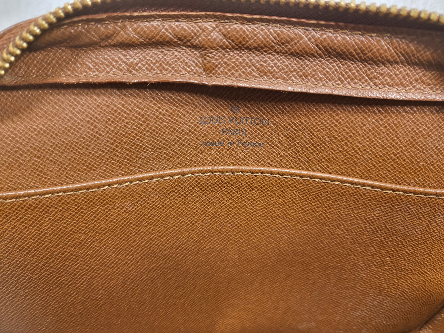 Authentic pre-owned Louis Vuitton Orsay monogram clutch