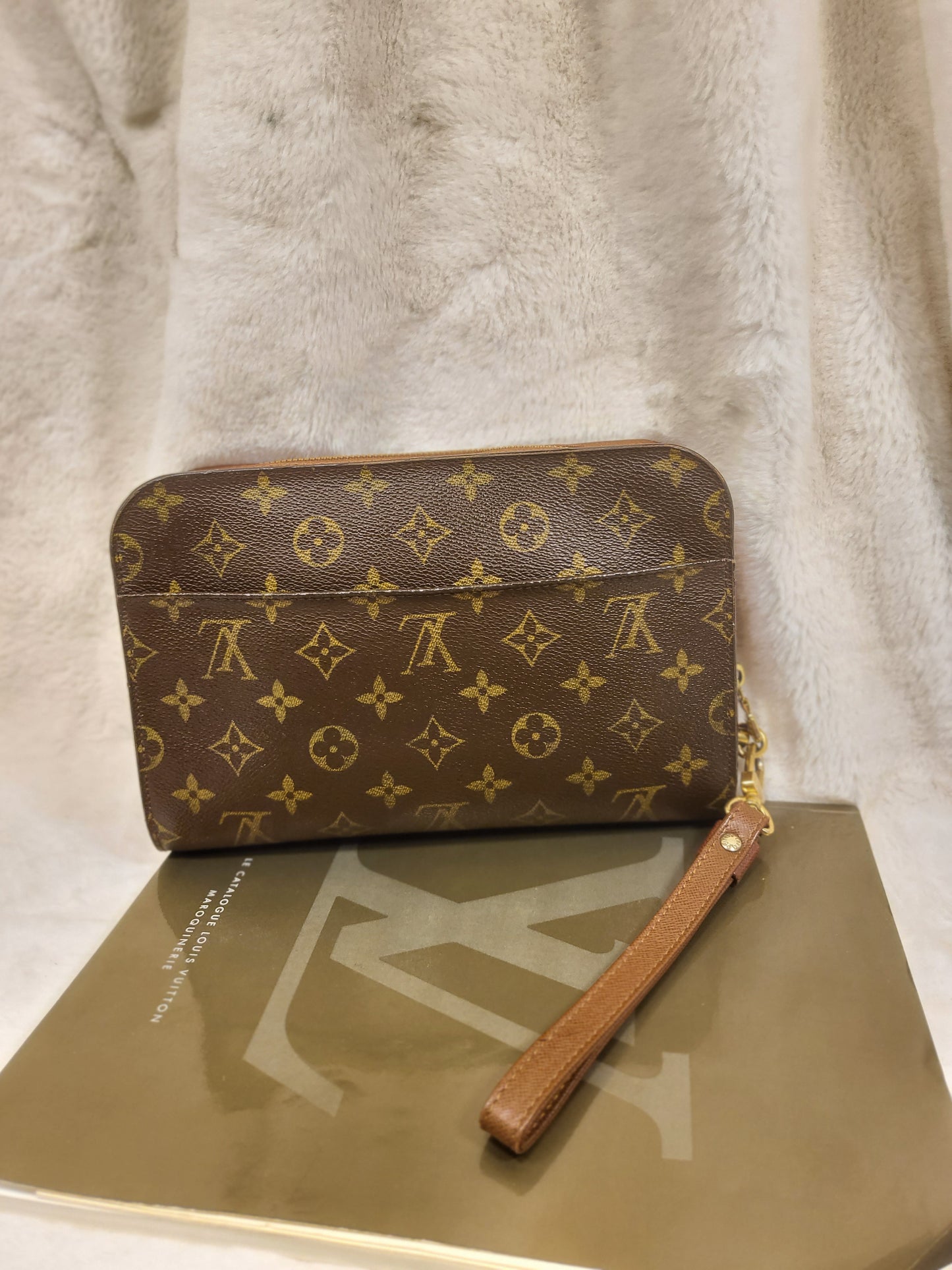 Authentic pre-owned Louis Vuitton Orsay monogram clutch