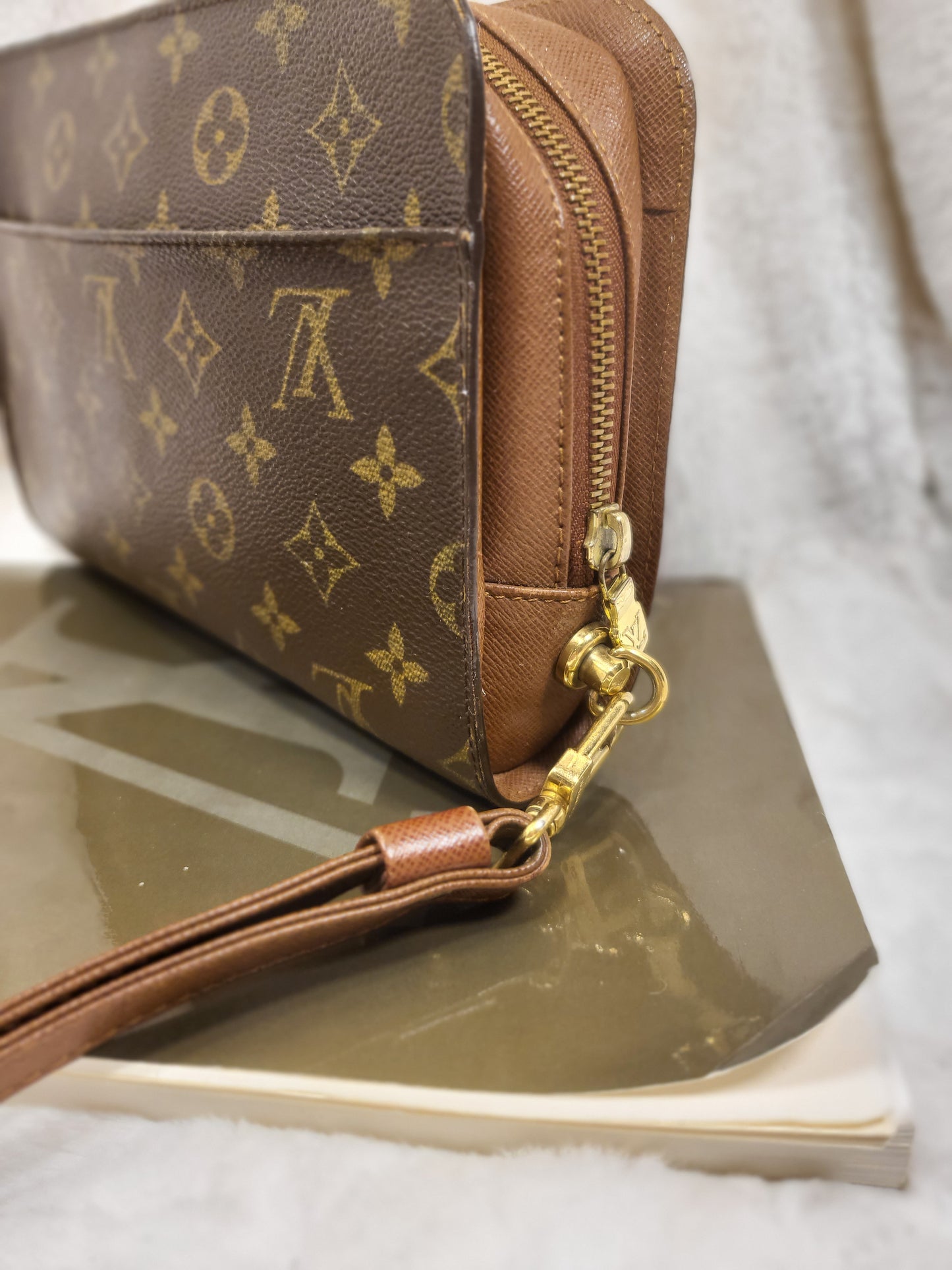 Authentic pre-owned Louis Vuitton Orsay monogram clutch