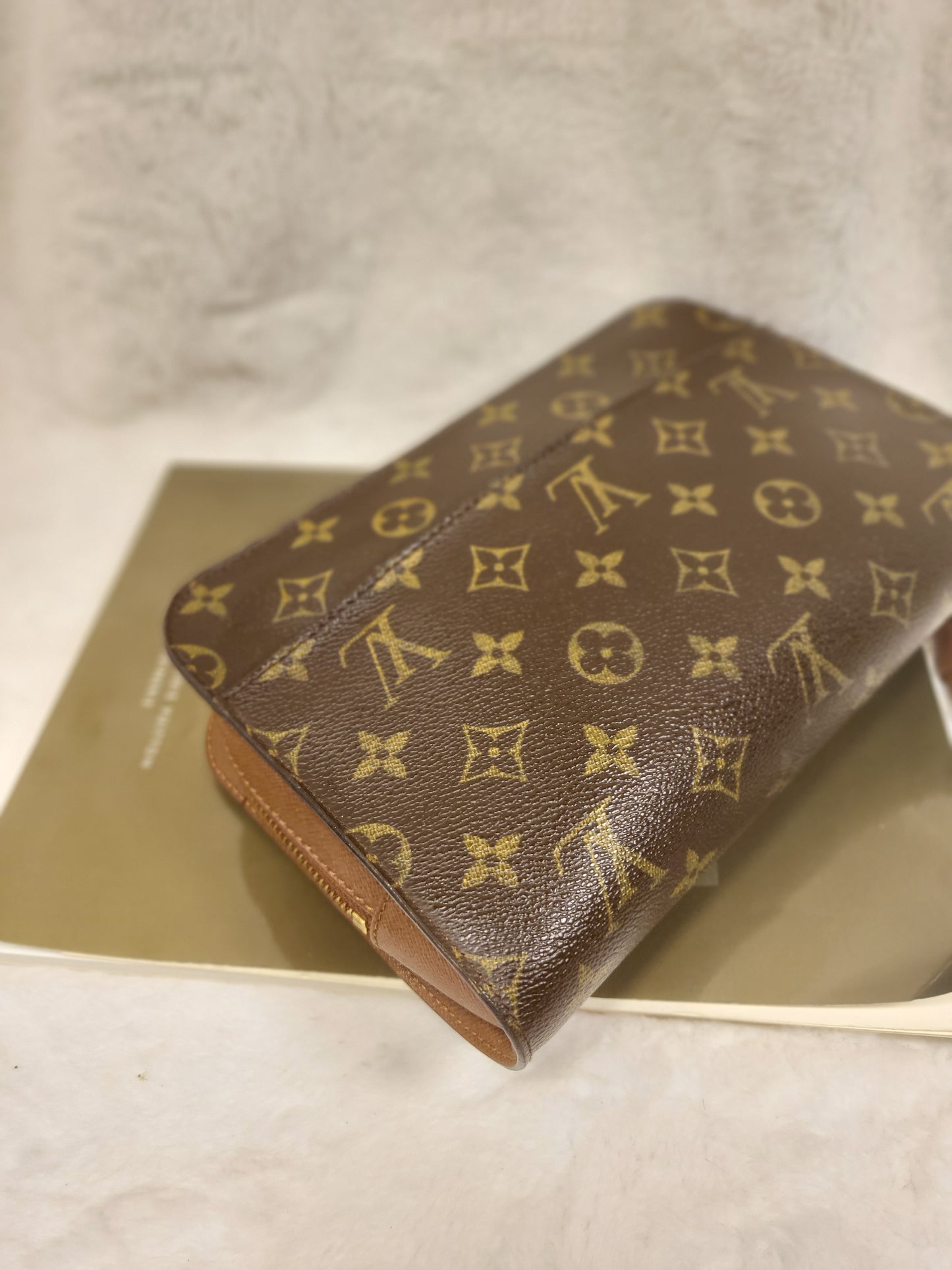Authentic pre-owned Louis Vuitton Orsay monogram clutch