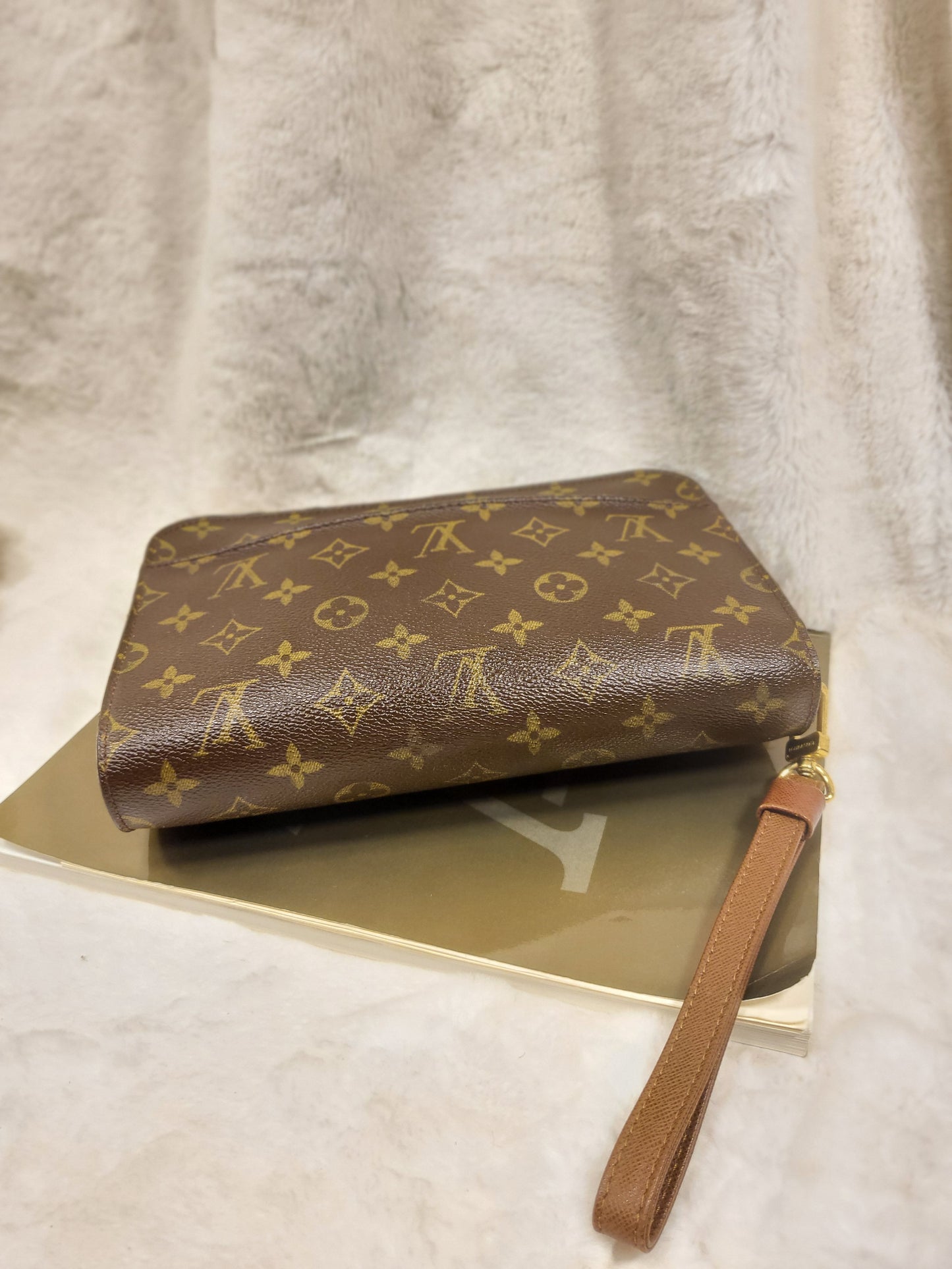 Authentic pre-owned Louis Vuitton Orsay monogram clutch