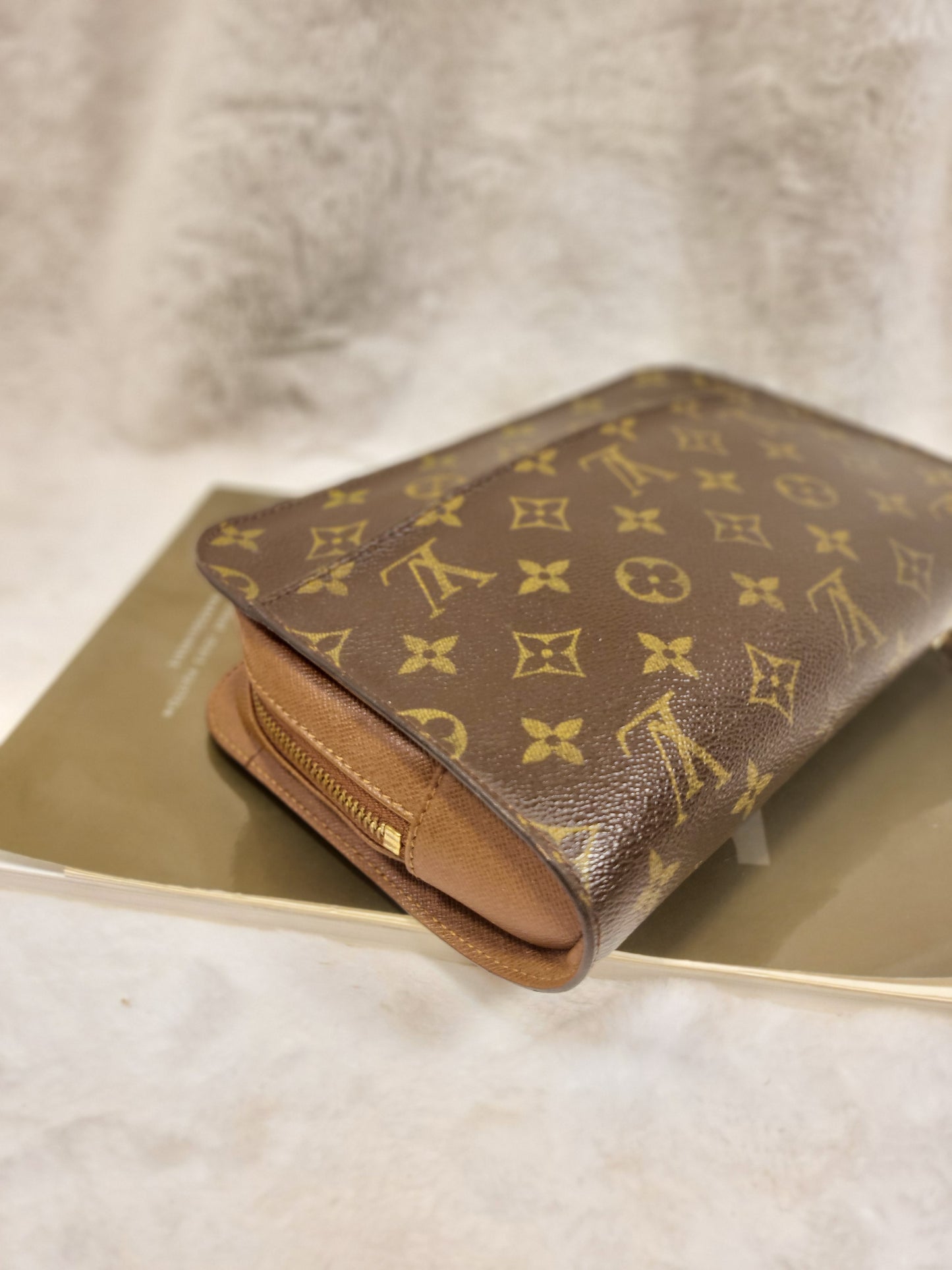 Authentic pre-owned Louis Vuitton Orsay monogram clutch