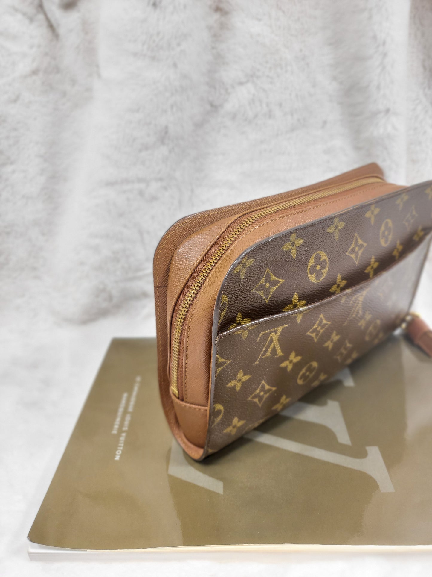 Authentic pre-owned Louis Vuitton Orsay monogram clutch