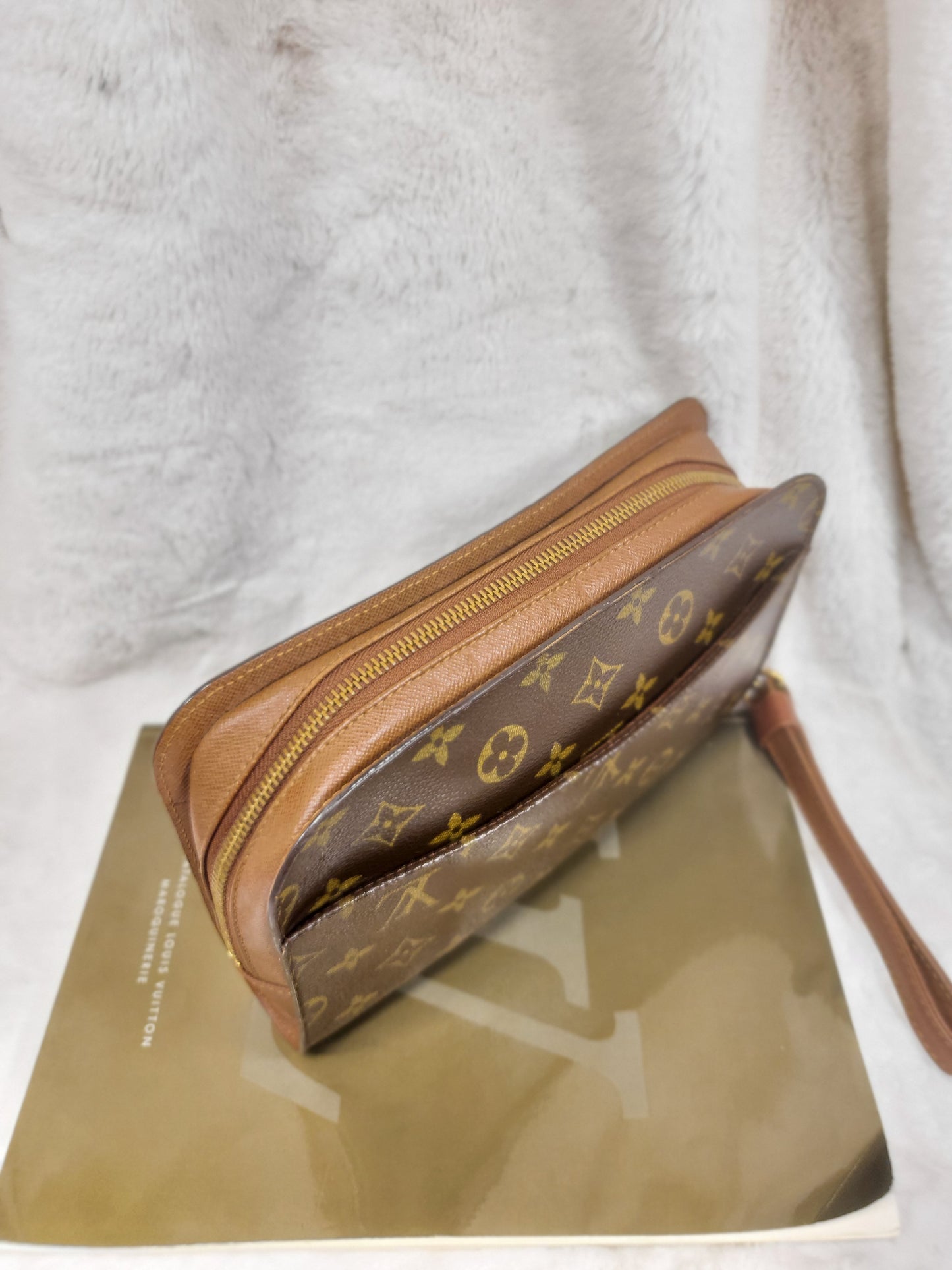 Authentic pre-owned Louis Vuitton Orsay monogram clutch
