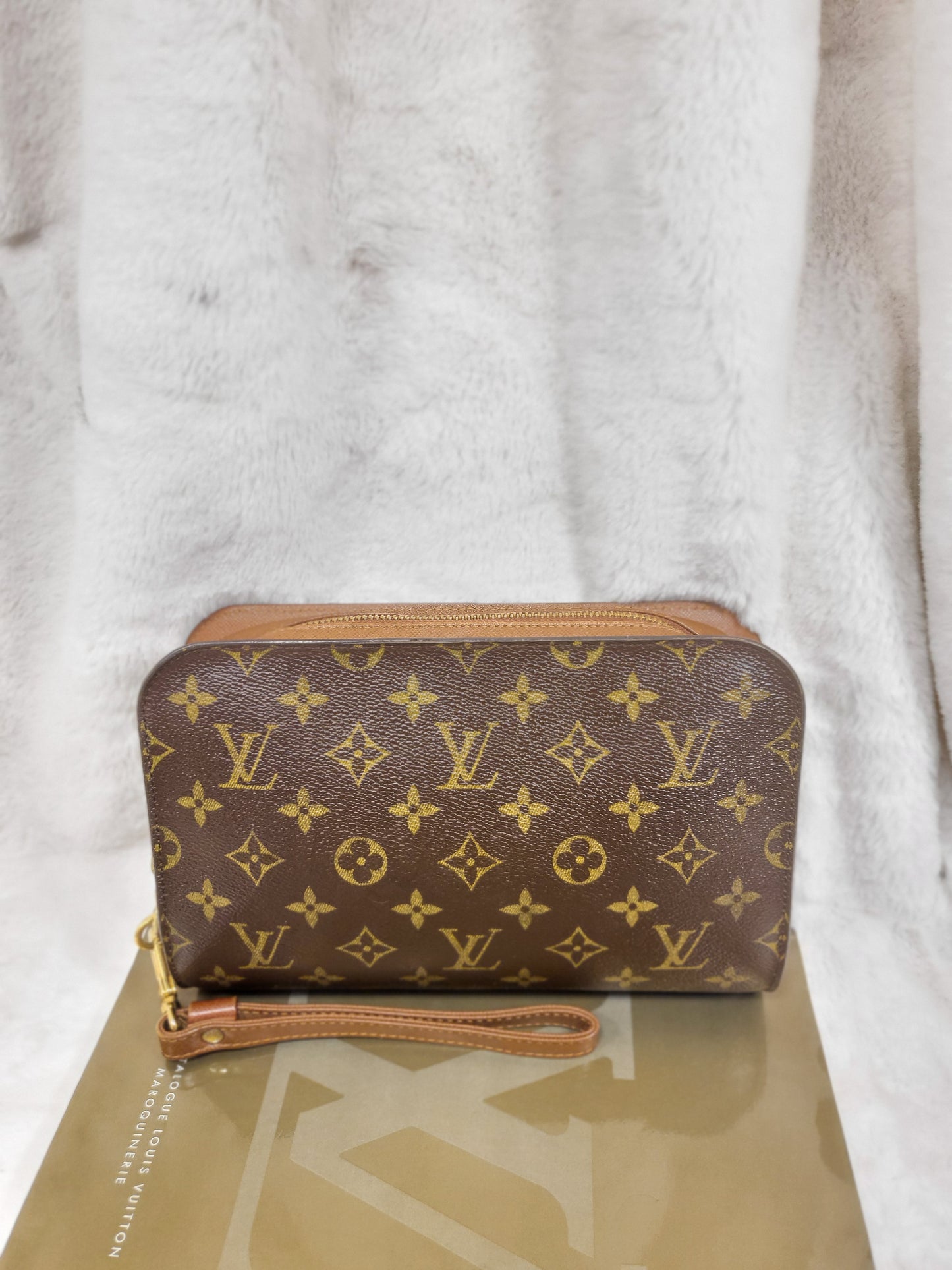 Authentic pre-owned Louis Vuitton Orsay monogram clutch