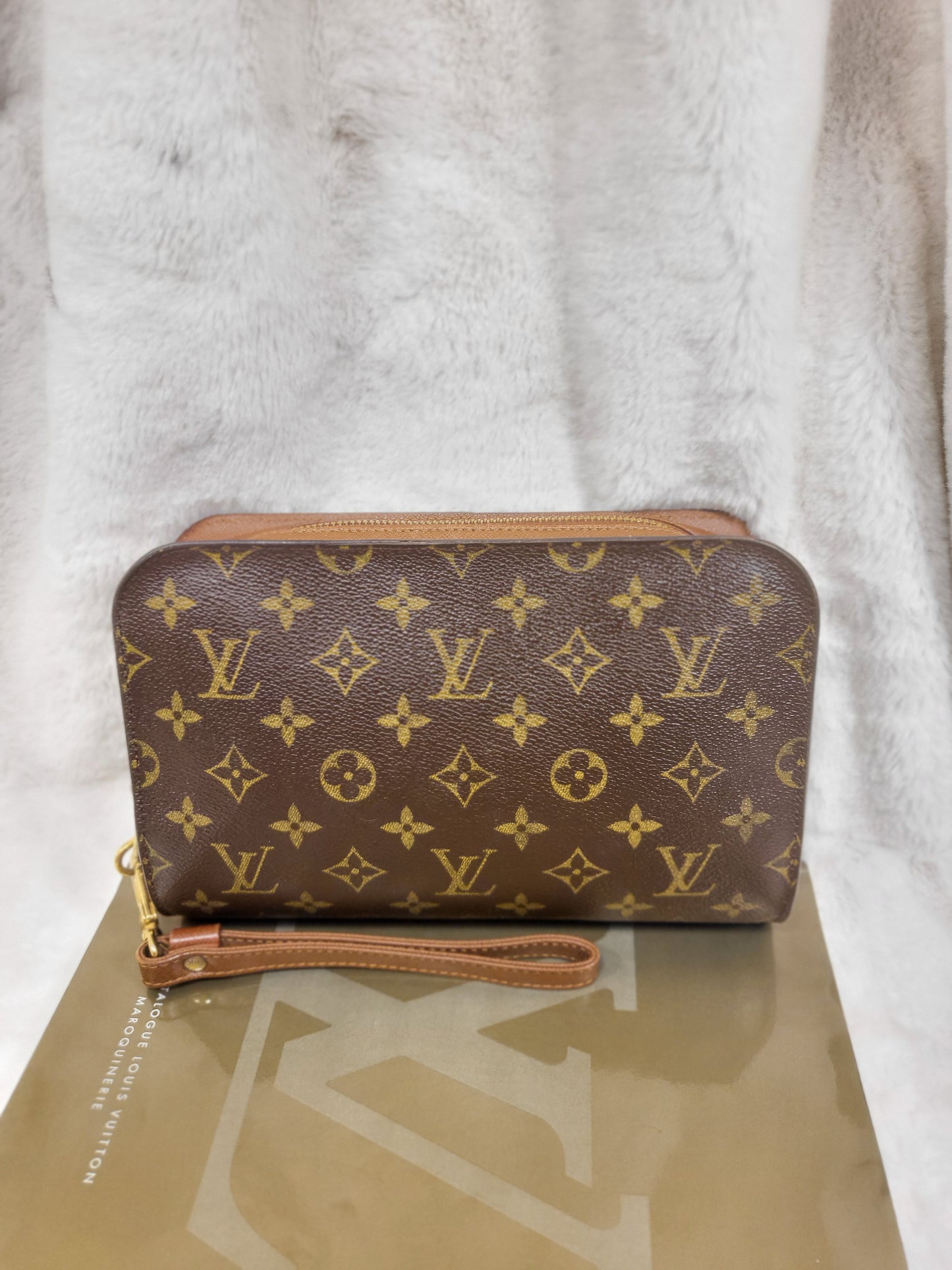 Authentic pre-owned Louis Vuitton Orsay monogram clutch