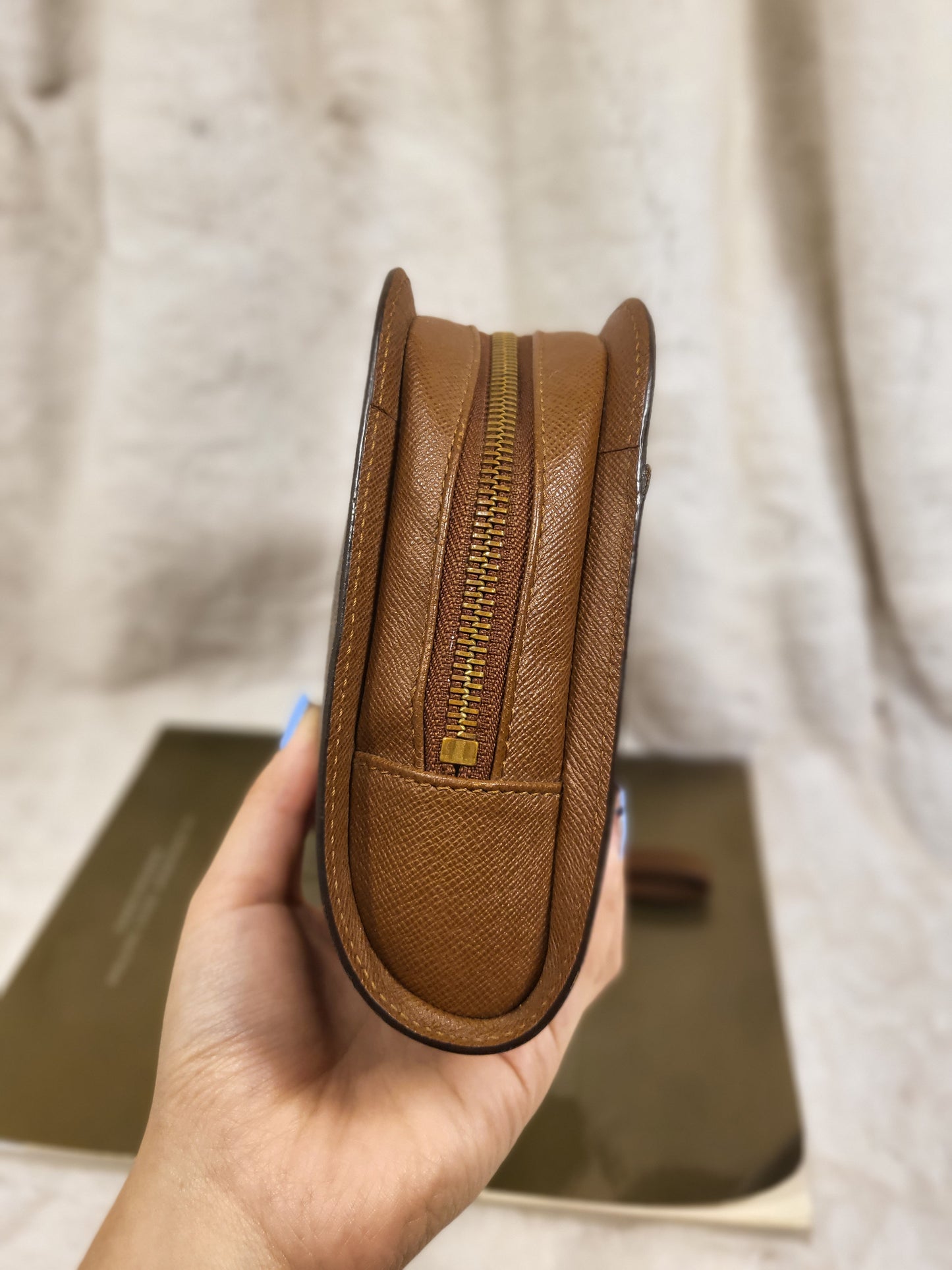 Authentic pre-owned Louis Vuitton Orsay monogram clutch