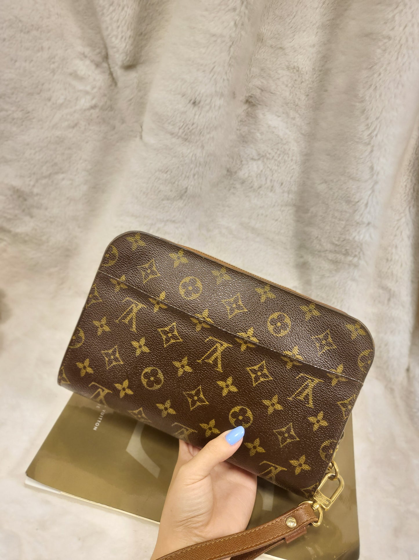 Authentic pre-owned Louis Vuitton Orsay monogram clutch