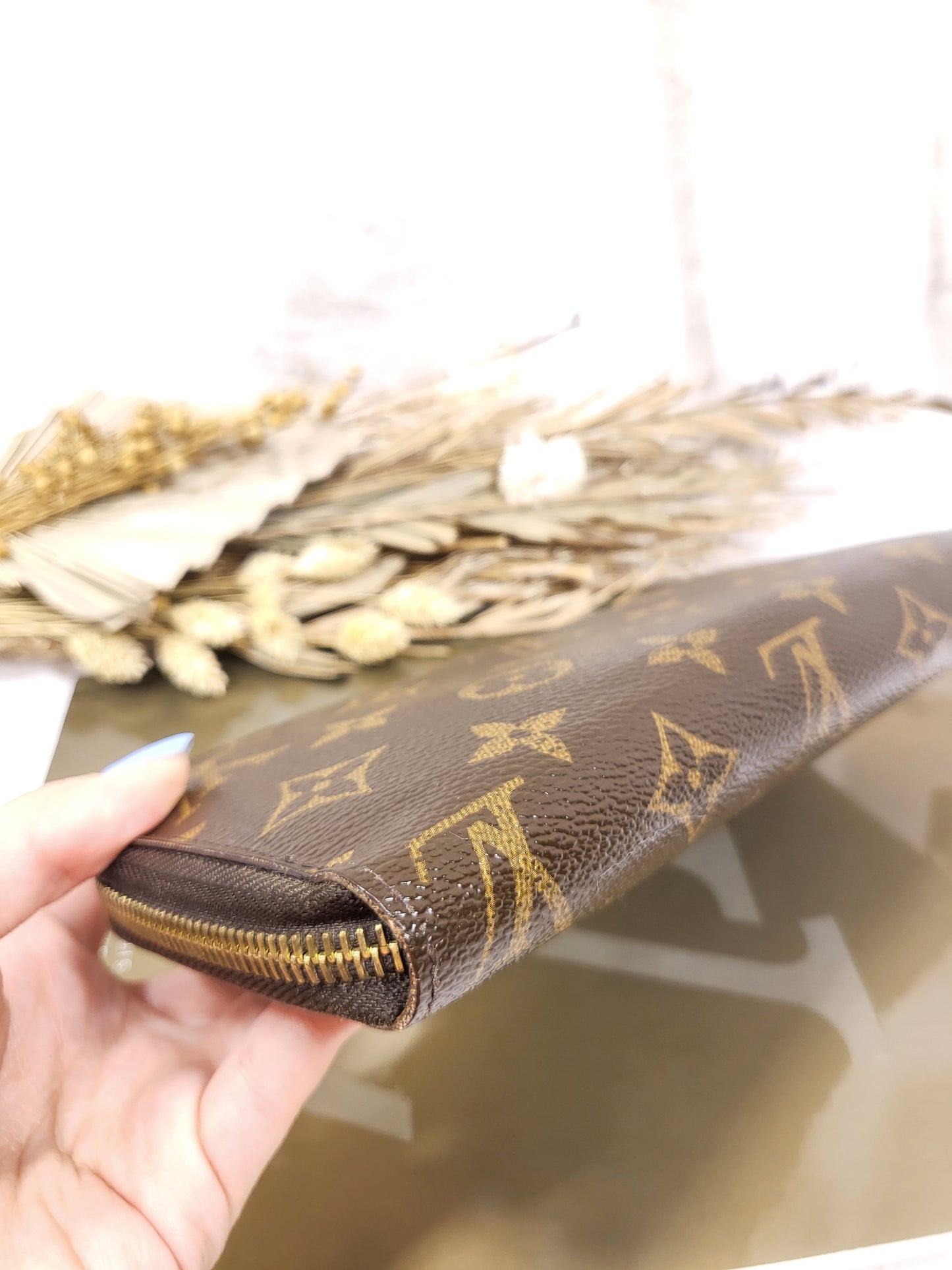 Authentic pre-owned Louis Vuitton Zippy compact wallet