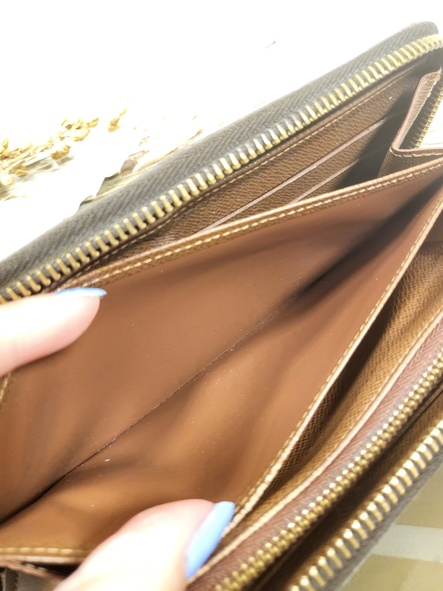 Authentic pre-owned Louis Vuitton Zippy compact wallet
