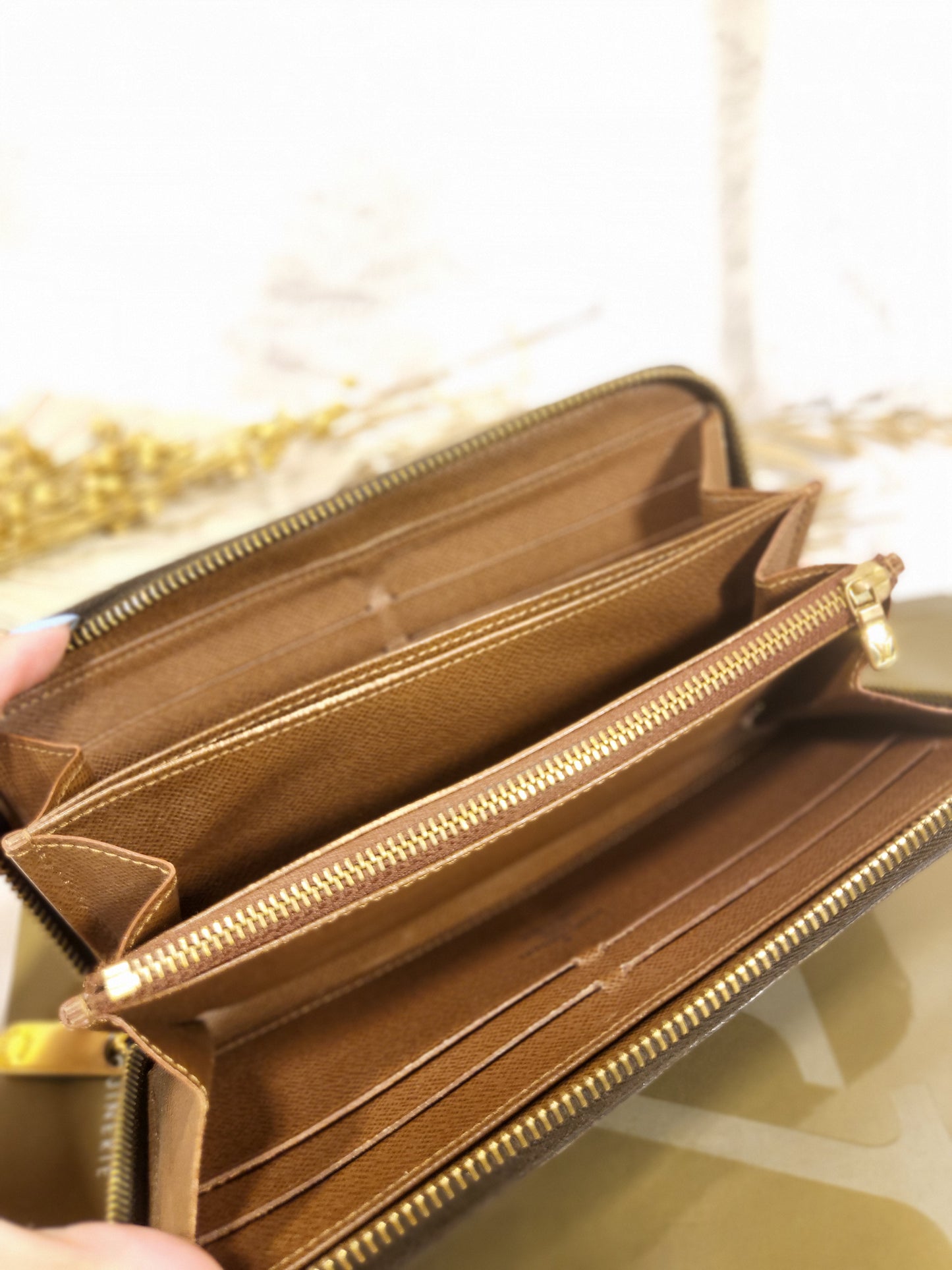 Authentic pre-owned Louis Vuitton Zippy compact wallet