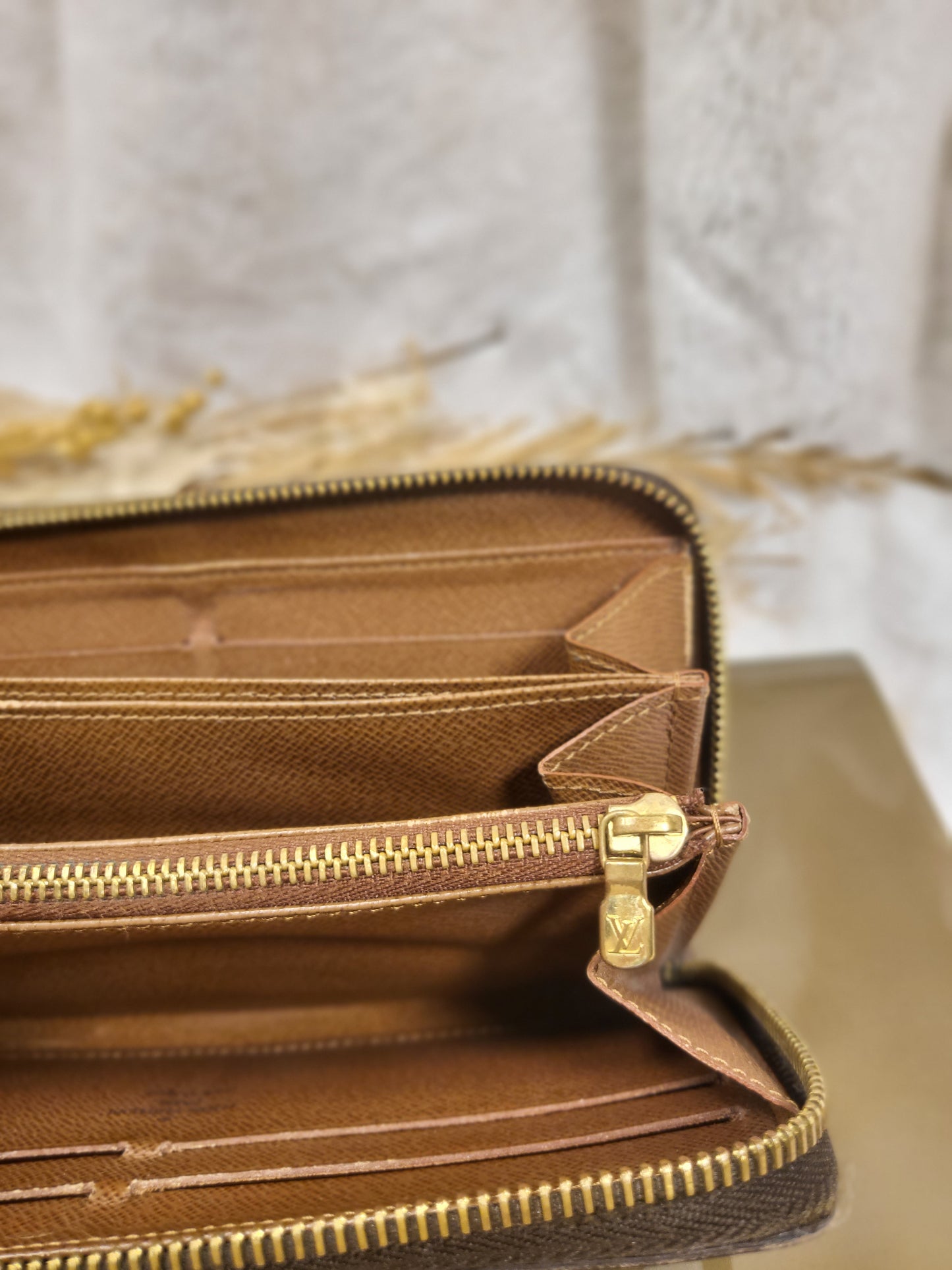 Authentic pre-owned Louis Vuitton Zippy compact wallet