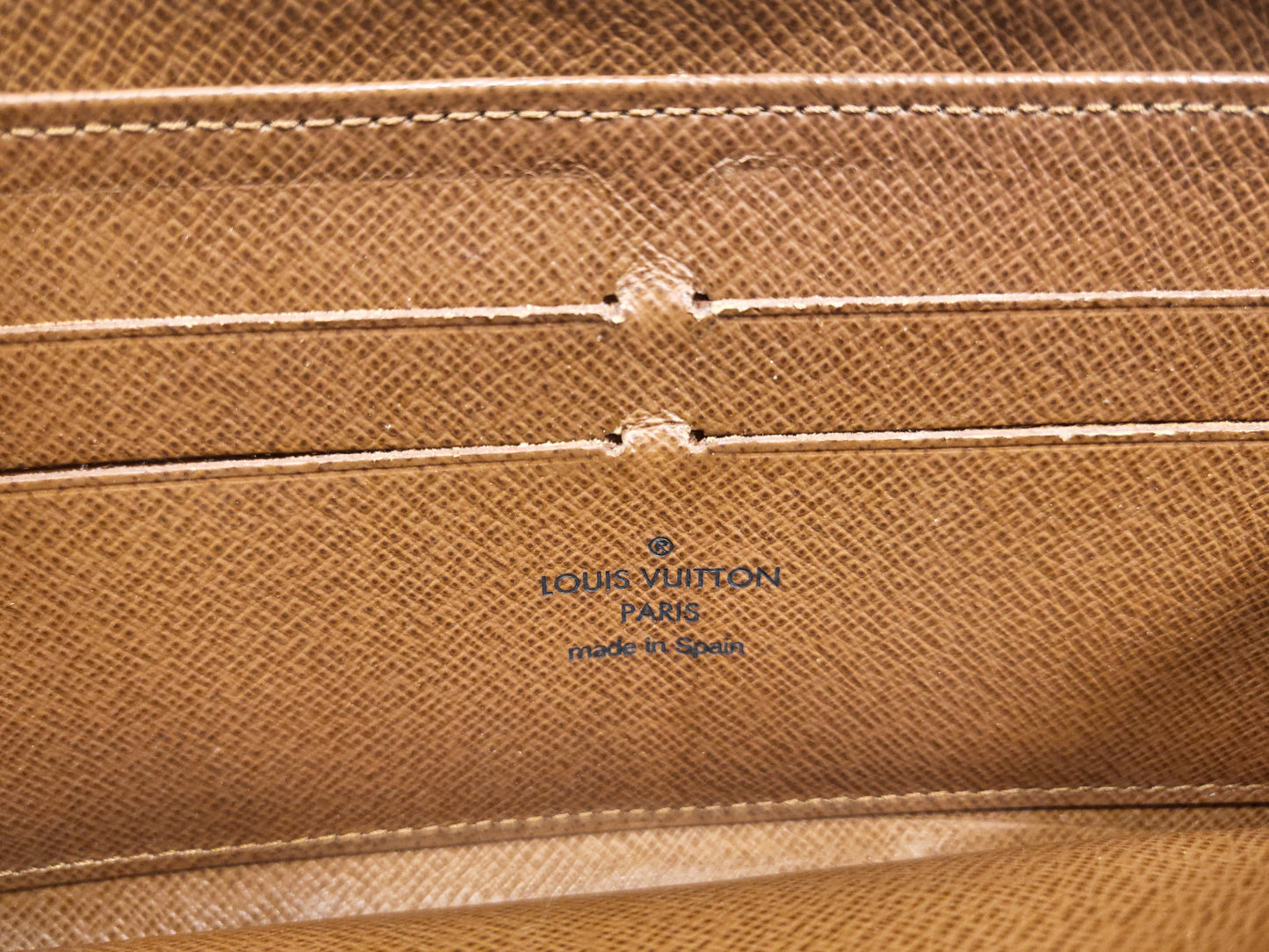 Authentic pre-owned Louis Vuitton Zippy compact wallet