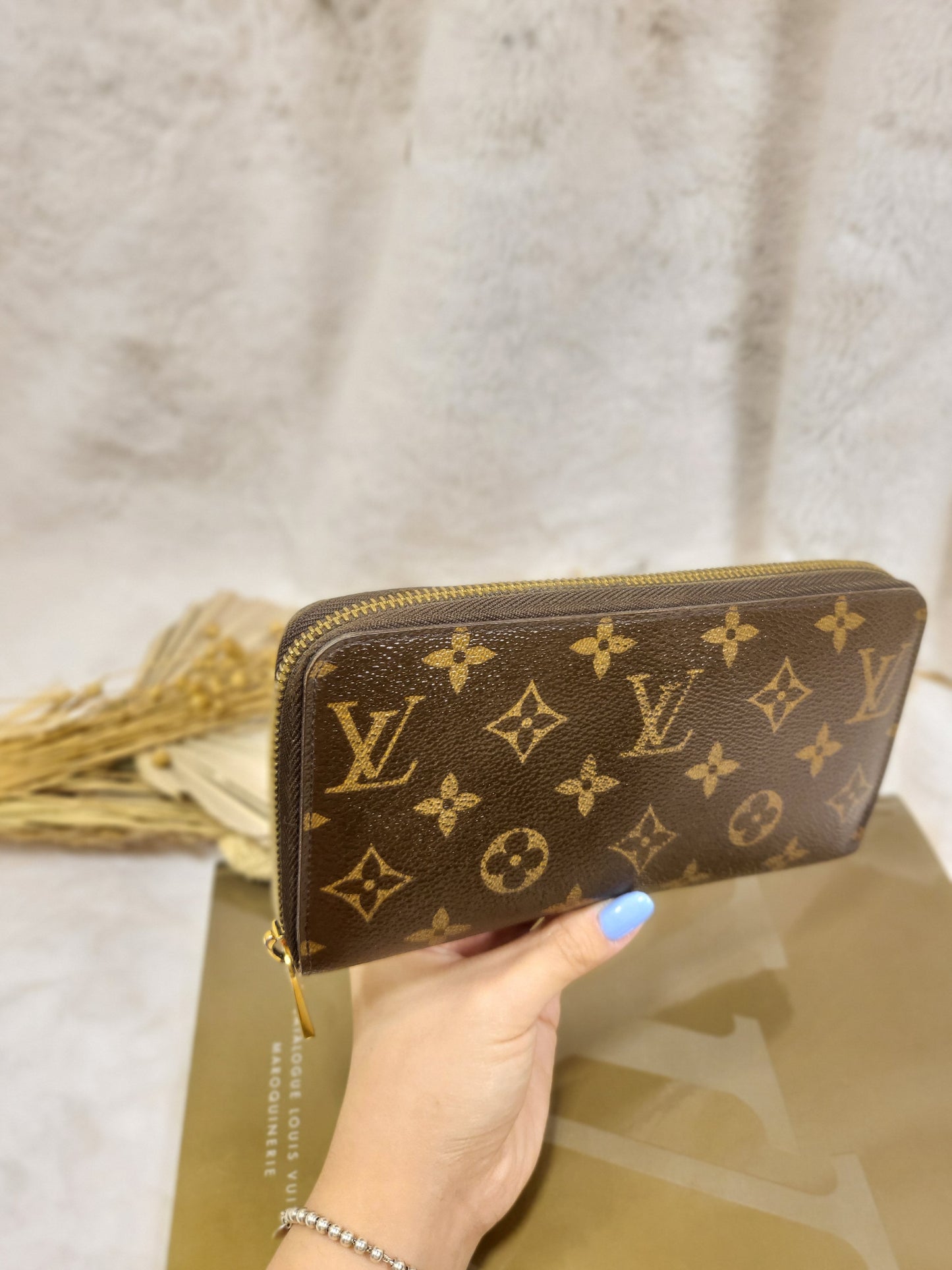 Authentic pre-owned Louis Vuitton Zippy compact wallet