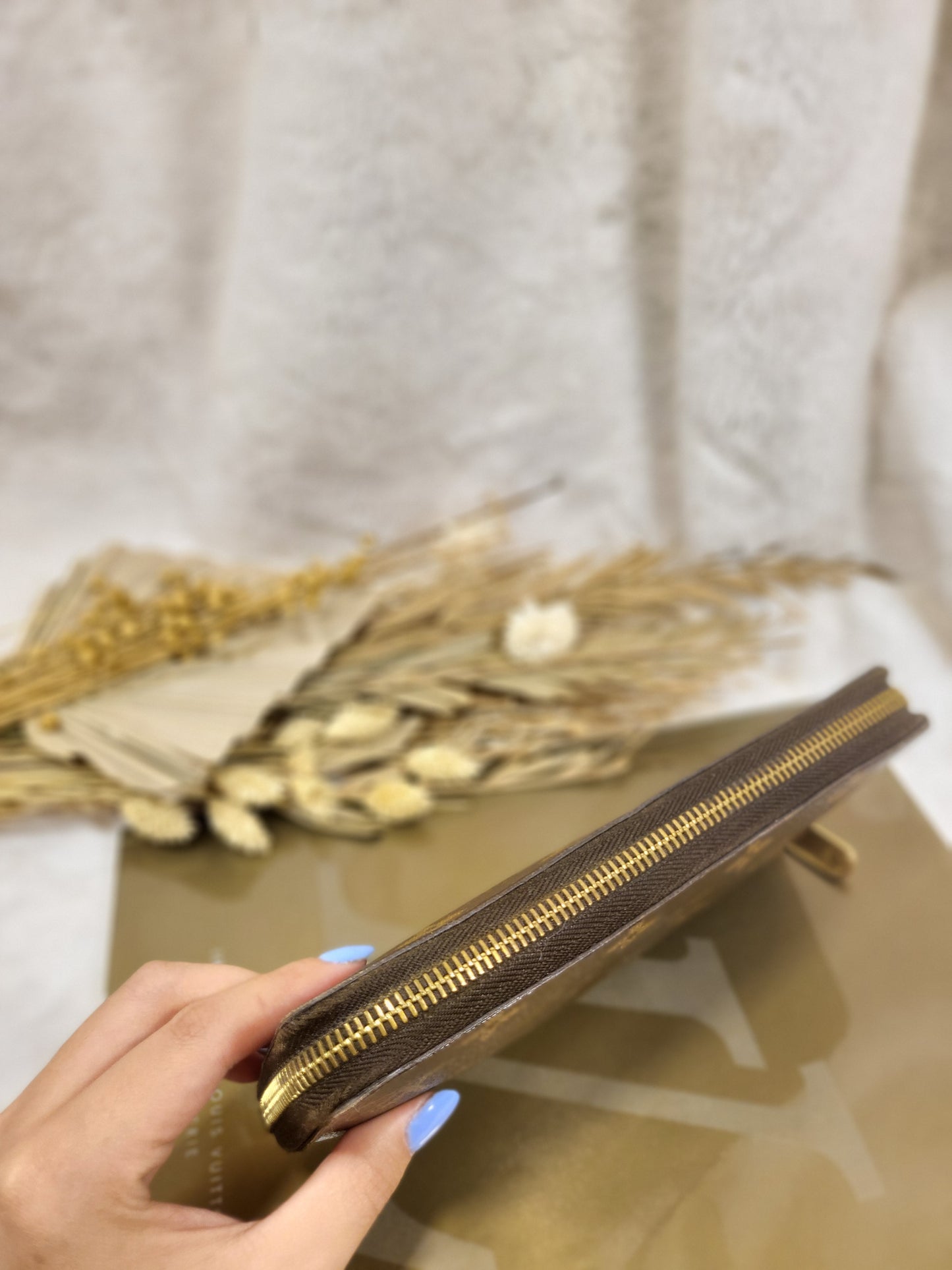 Authentic pre-owned Louis Vuitton Zippy compact wallet