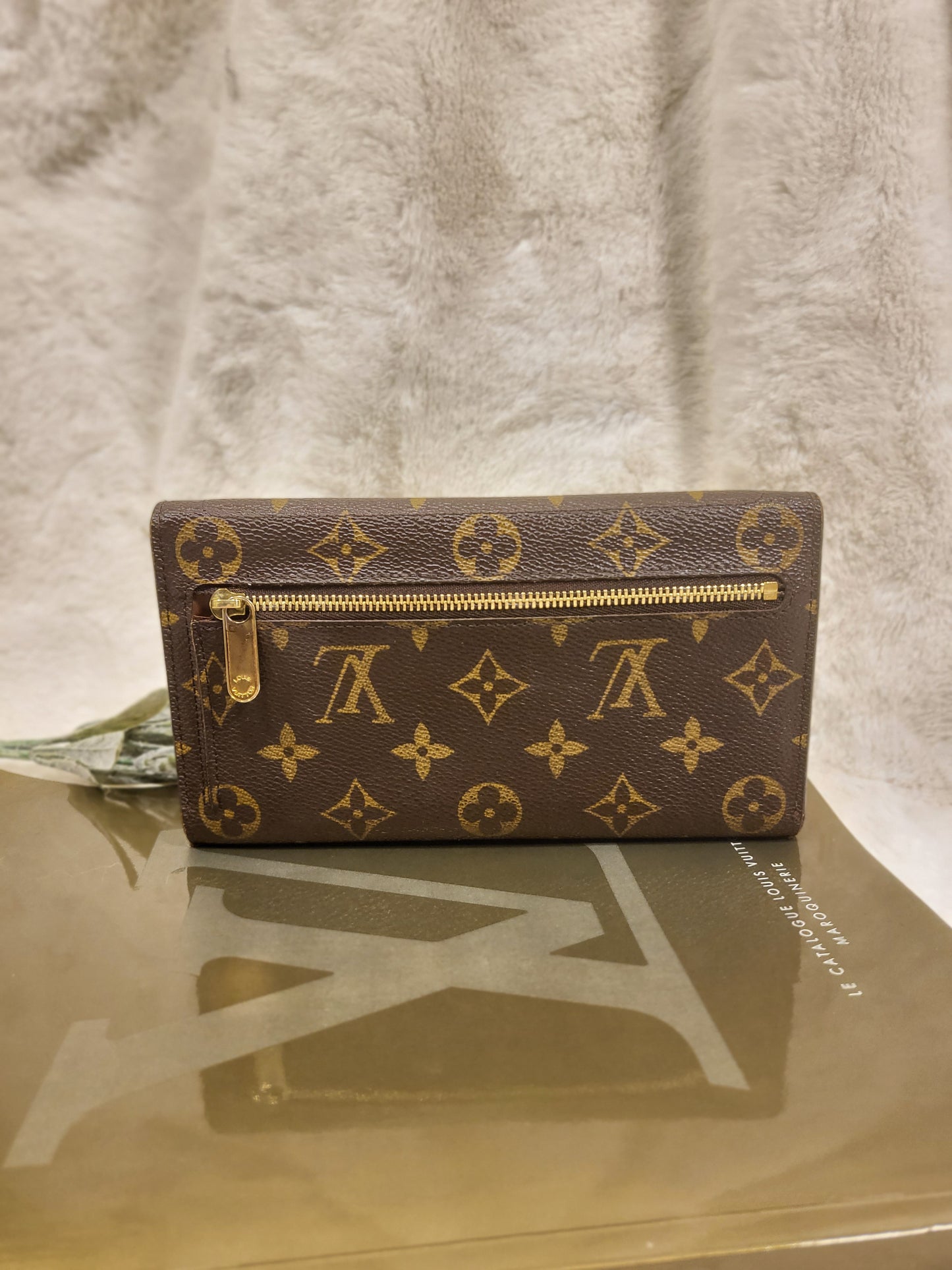 Authentic pre-owned Louis Vuitton Portefeuille Eugenie long wallet