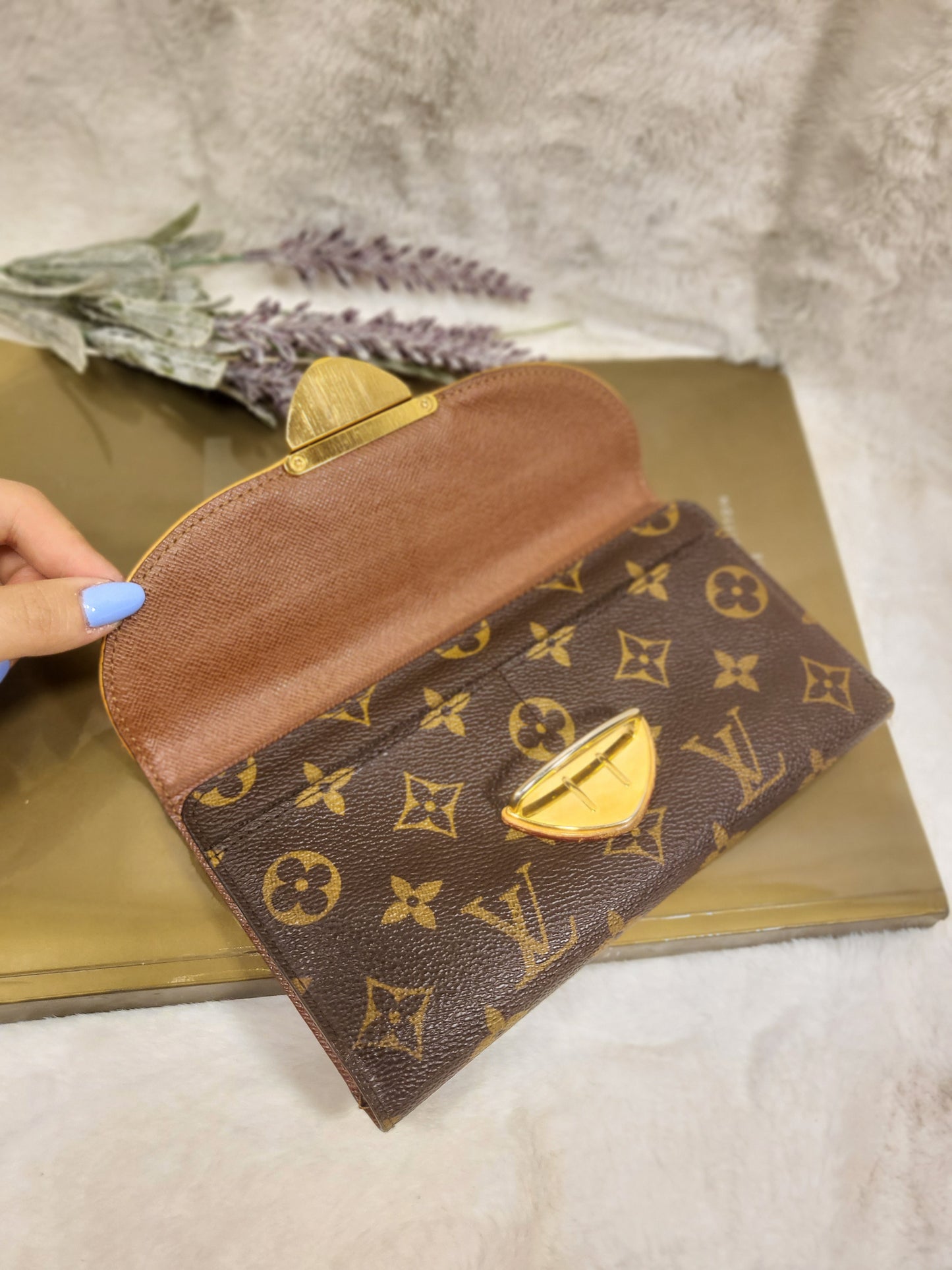 Authentic pre-owned Louis Vuitton Portefeuille Eugenie long wallet