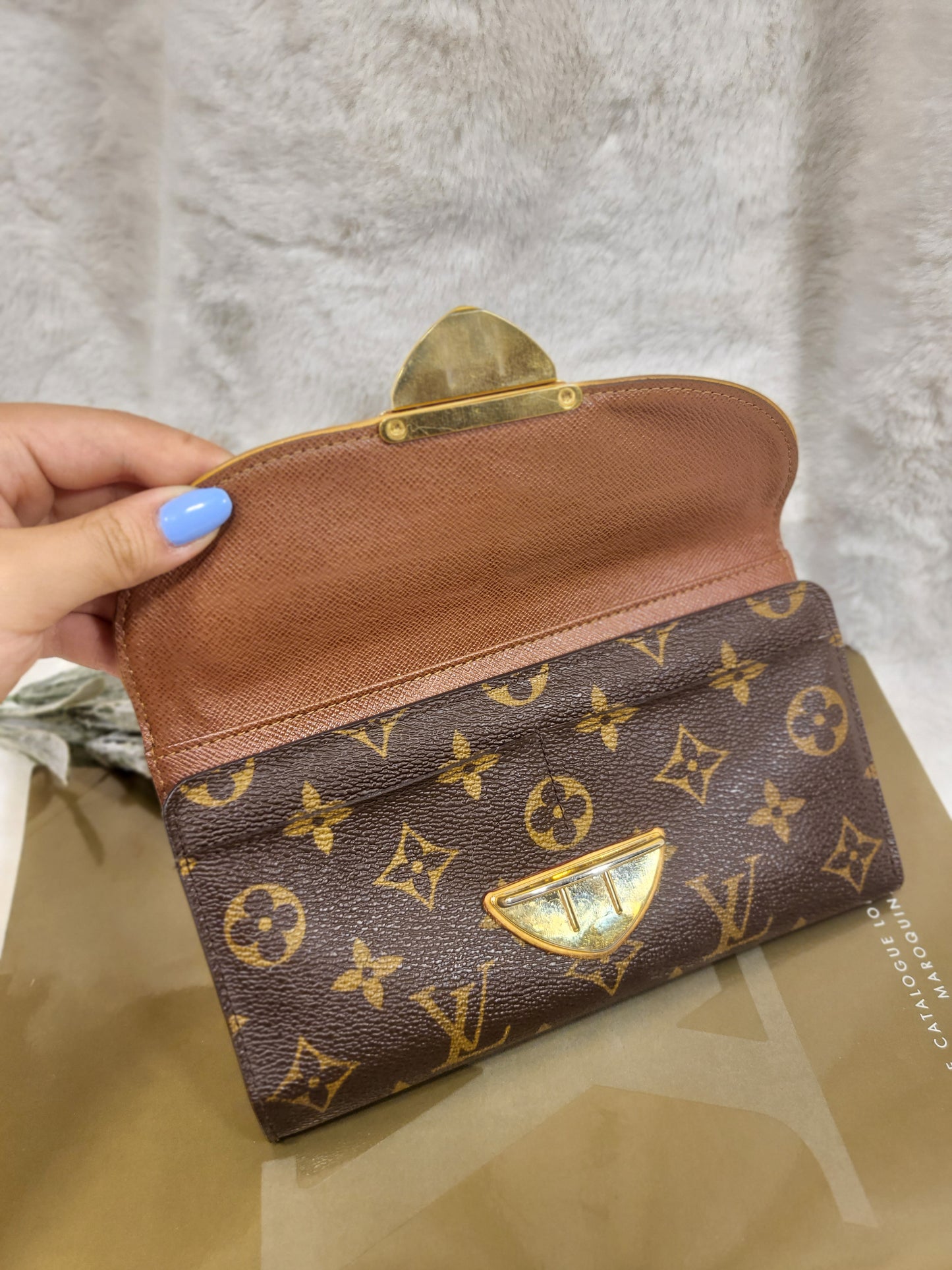 Authentic pre-owned Louis Vuitton Portefeuille Eugenie long wallet