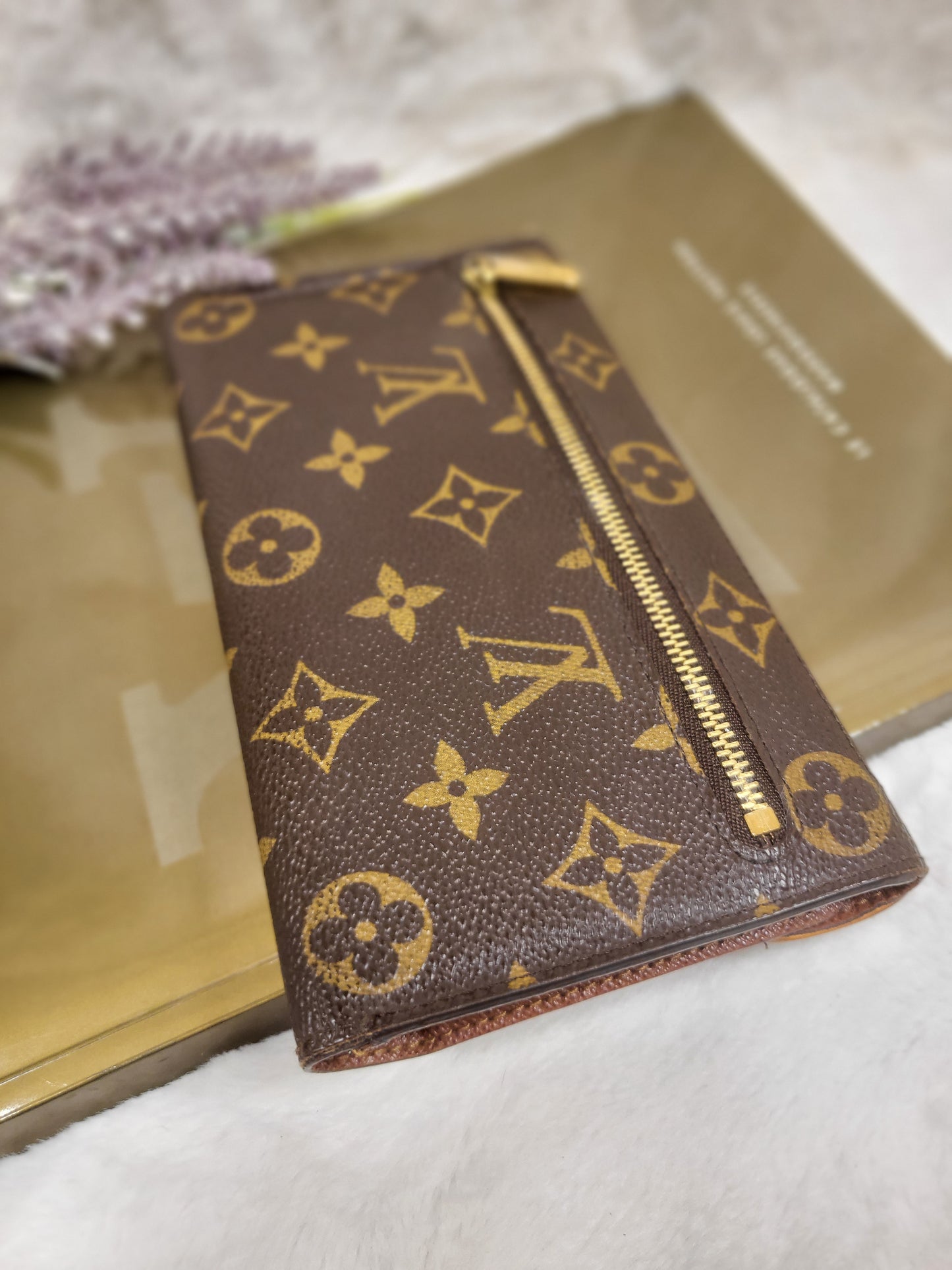 Authentic pre-owned Louis Vuitton Portefeuille Eugenie long wallet