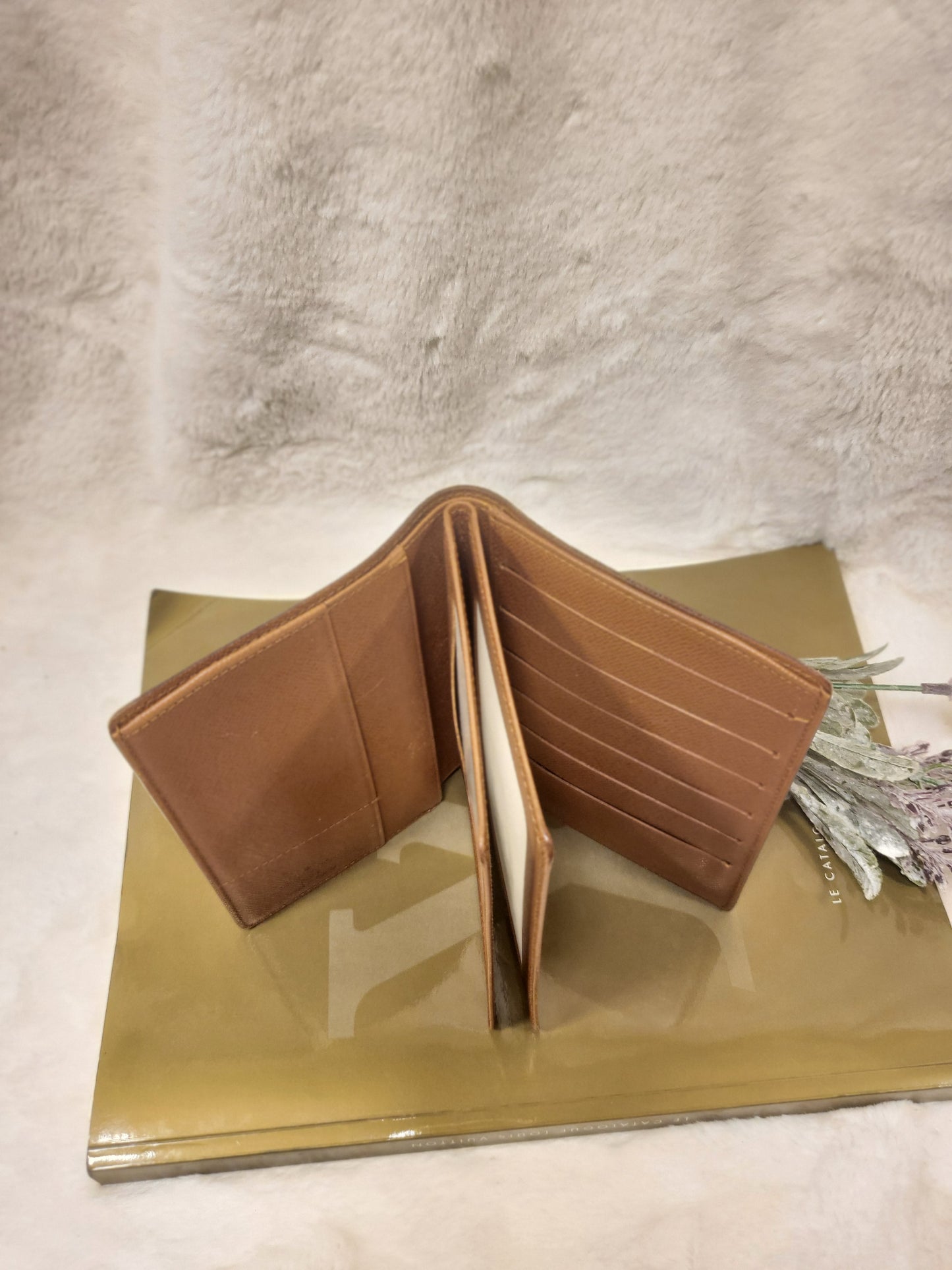 Authentic pre-owned Louis Vuitton passport holder