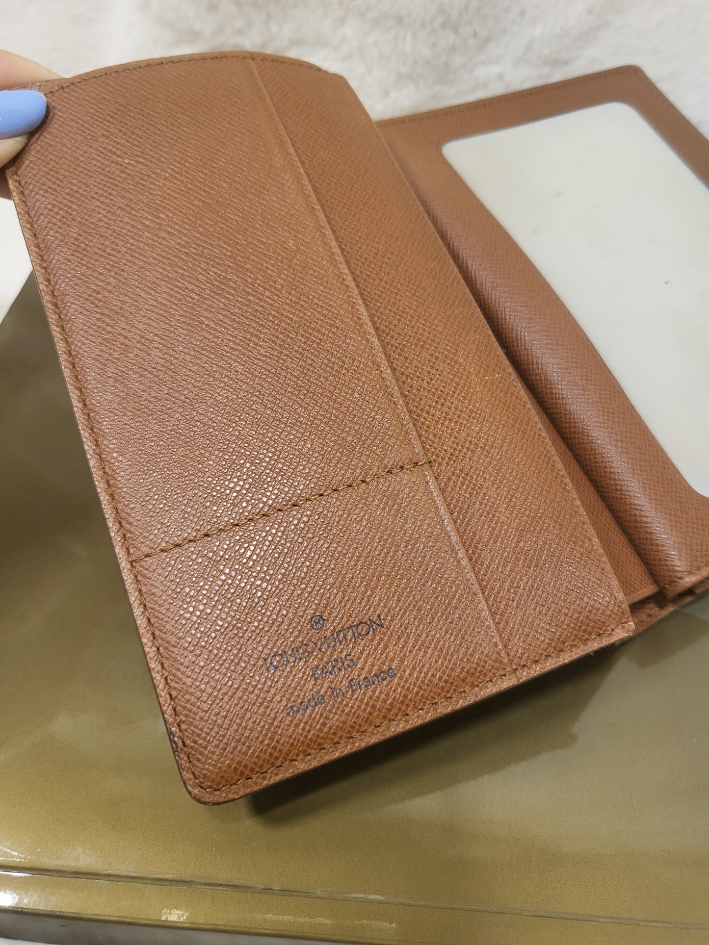 Authentic pre-owned Louis Vuitton passport holder