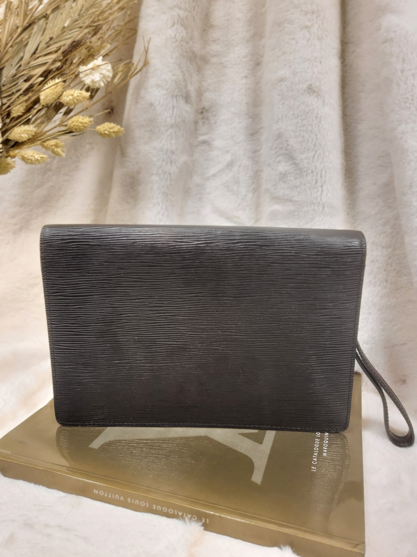 Authentic pre-owned Louis Vuitton Serie Dragonne epi black noir clutch