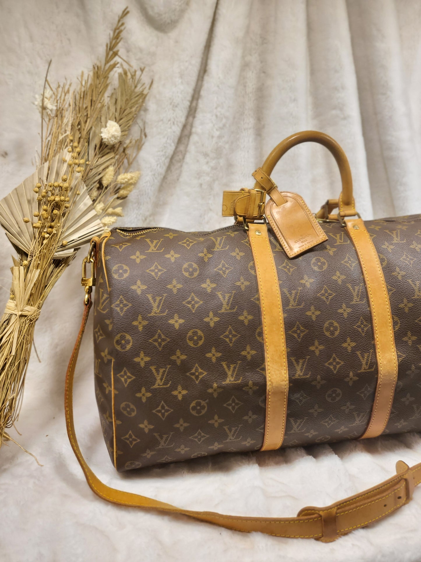 Authentic pre-owned Louis Vuitton Keepall 50 bandoliere travel duffel bag