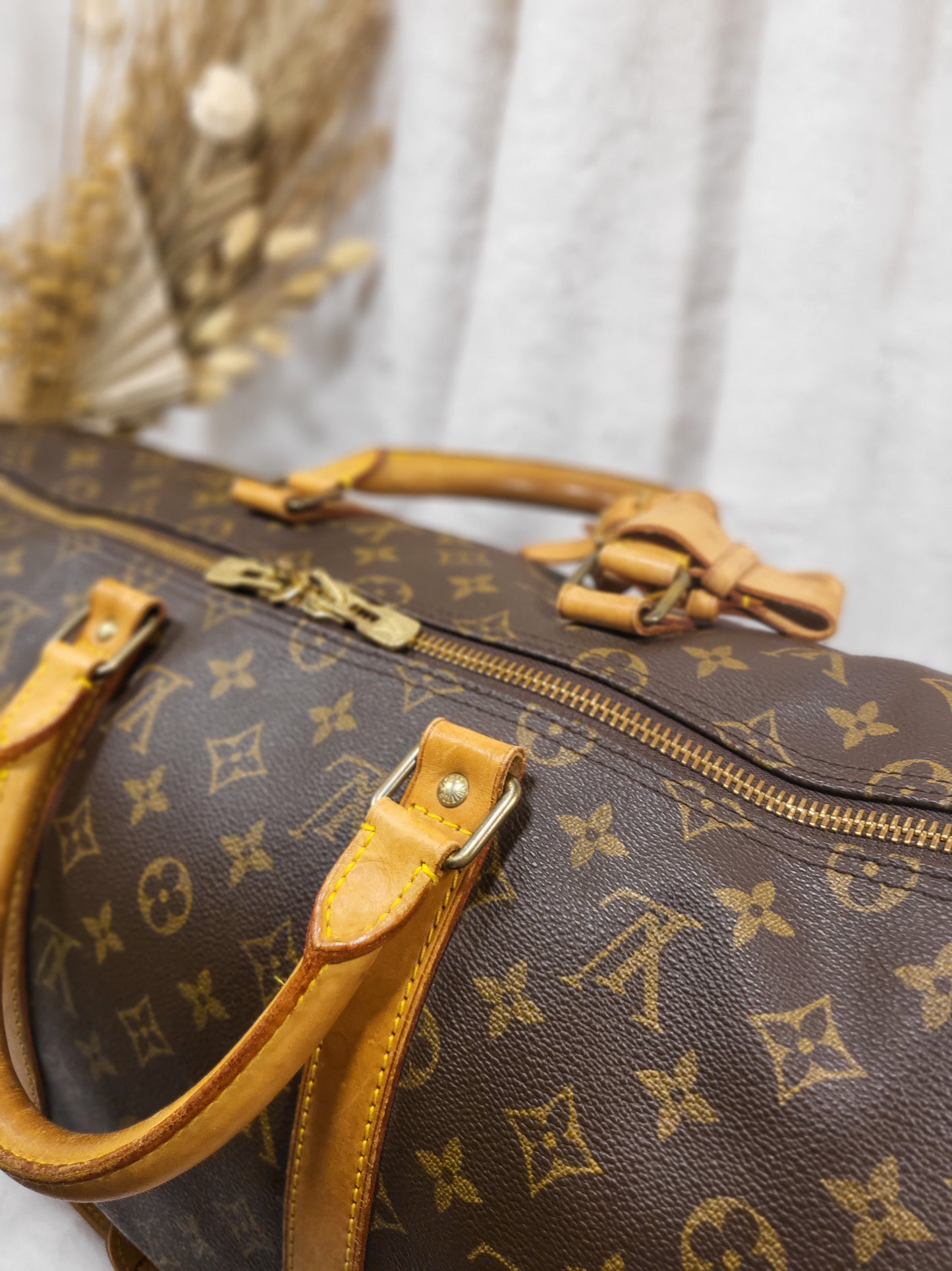 Authentic pre-owned Louis Vuitton Keepall 50 bandoliere travel duffel bag