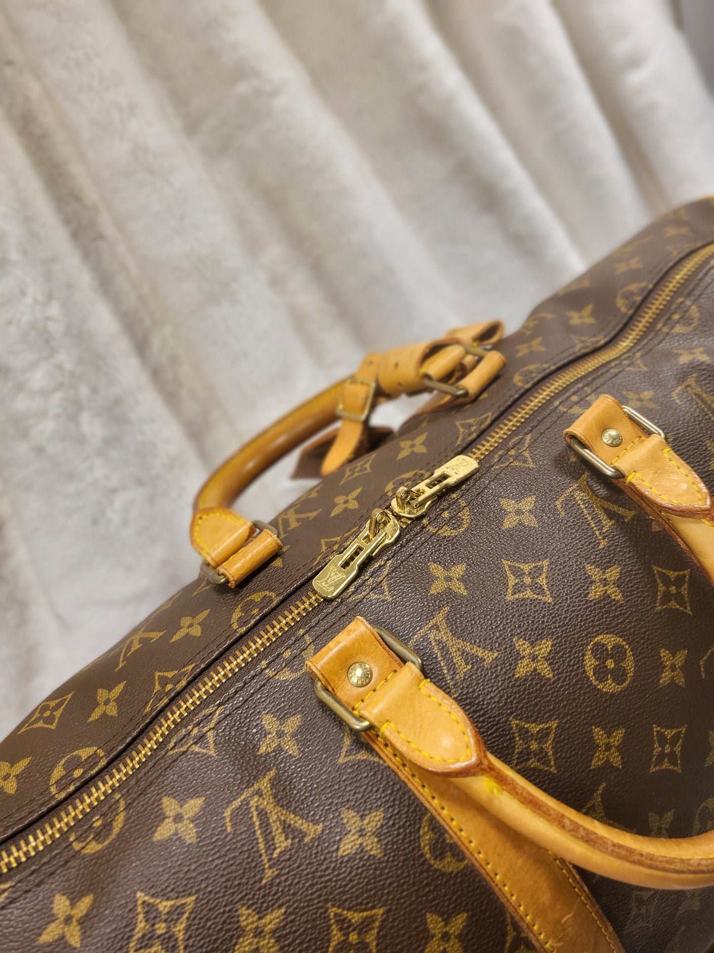 Authentic pre-owned Louis Vuitton Keepall 50 bandoliere travel duffel bag