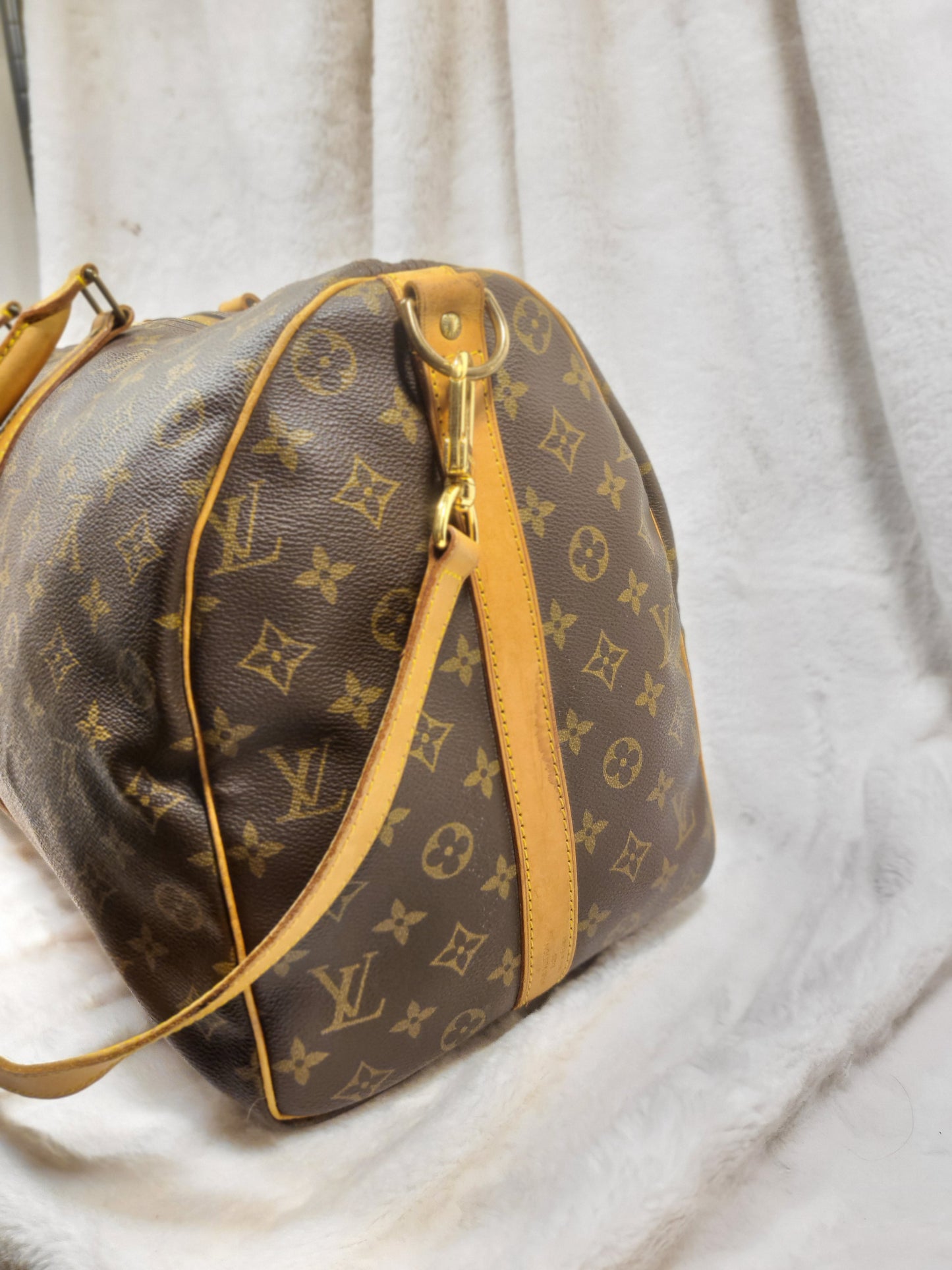 Authentic pre-owned Louis Vuitton Keepall 50 bandoliere travel duffel bag
