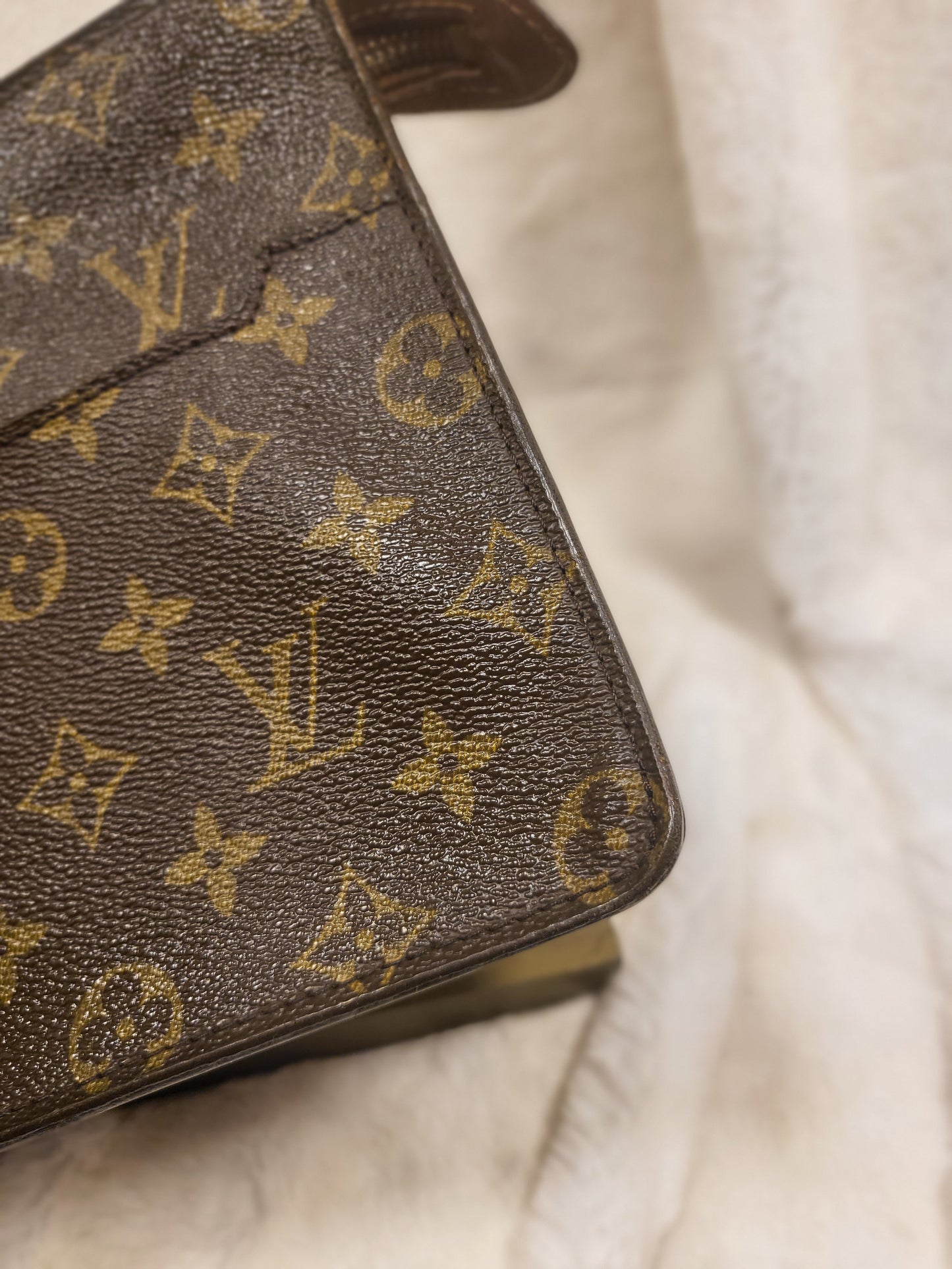 Authentic pre-owned Louis Vuitton Pochette Homme clutch