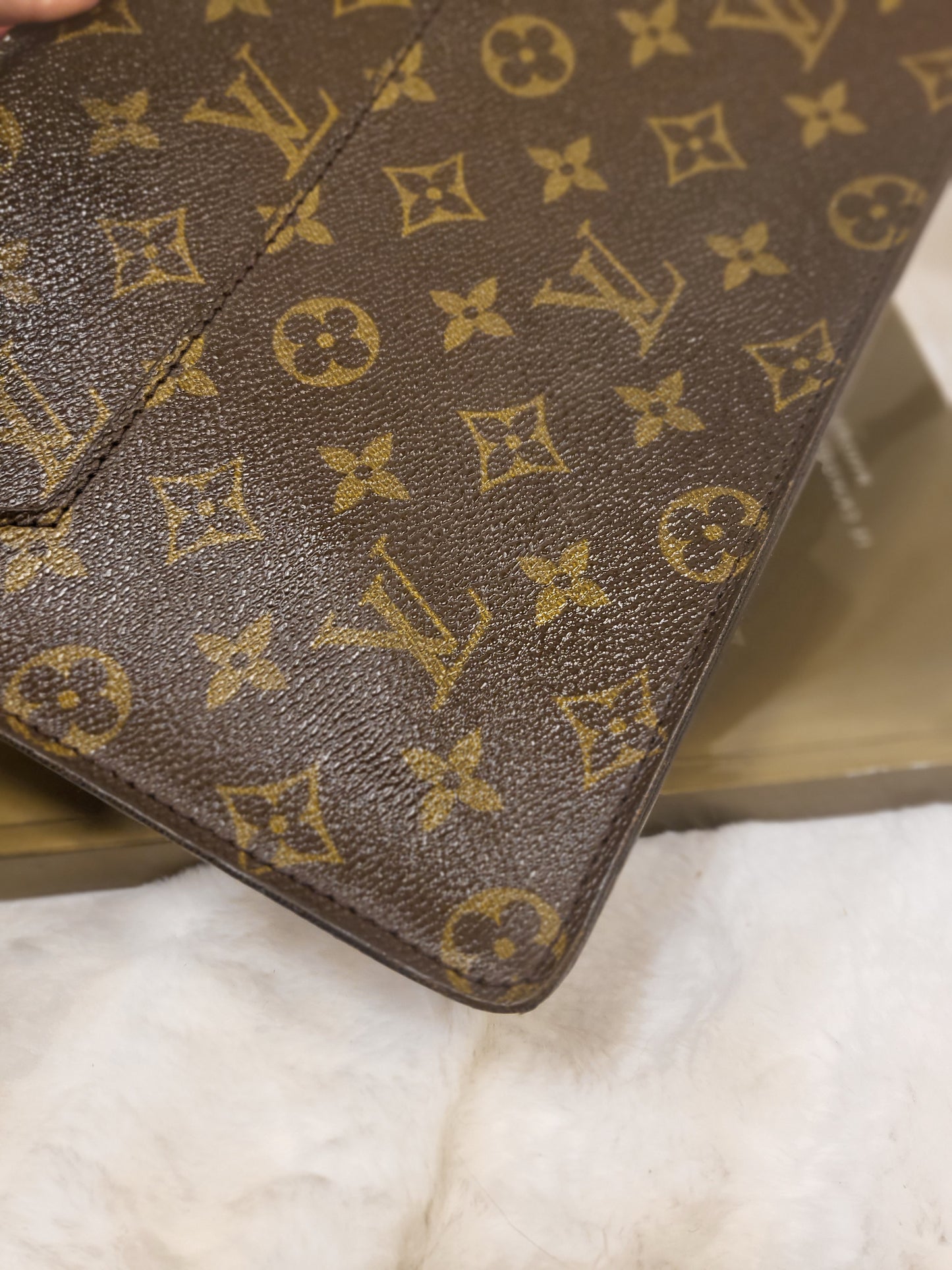Authentic pre-owned Louis Vuitton Pochette Homme clutch