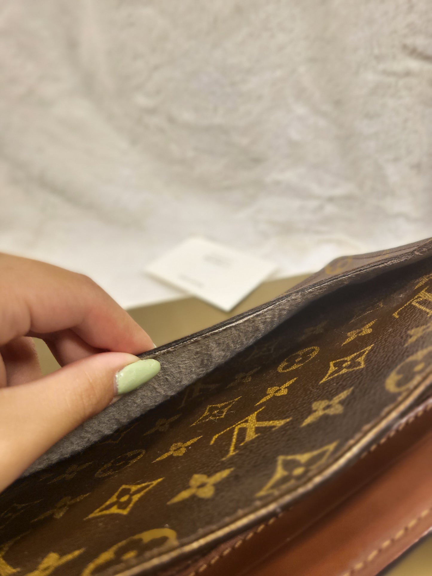 Authentic pre-owned Louis Vuitton Pochette Homme clutch
