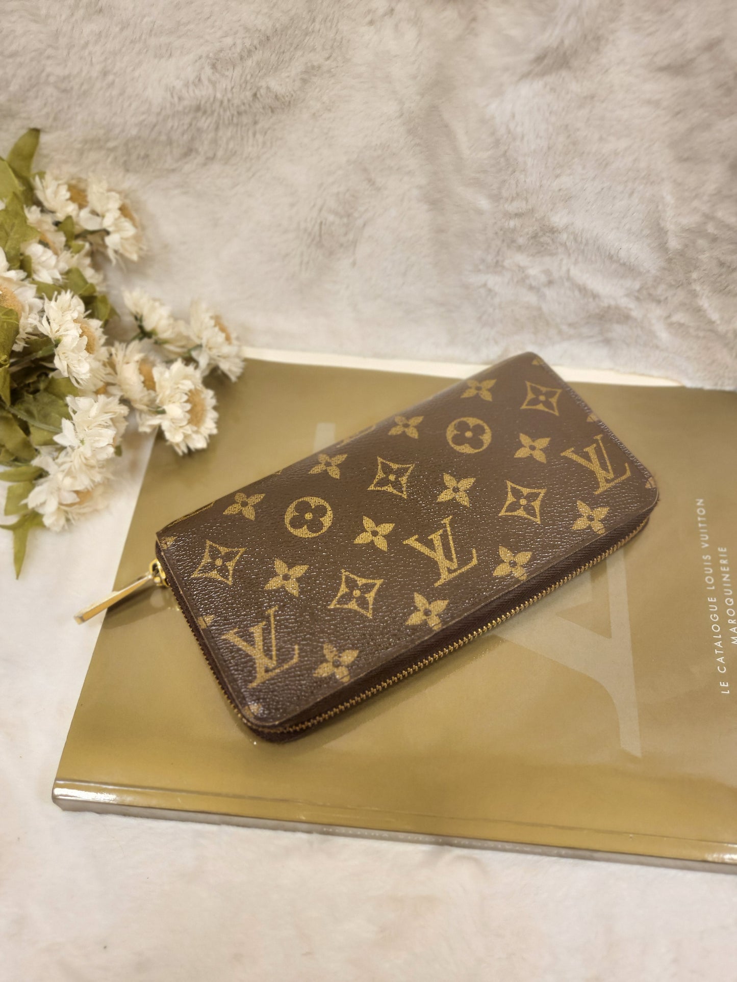 Authentic pre-owned Louis Vuitton Zippy wallet monogram