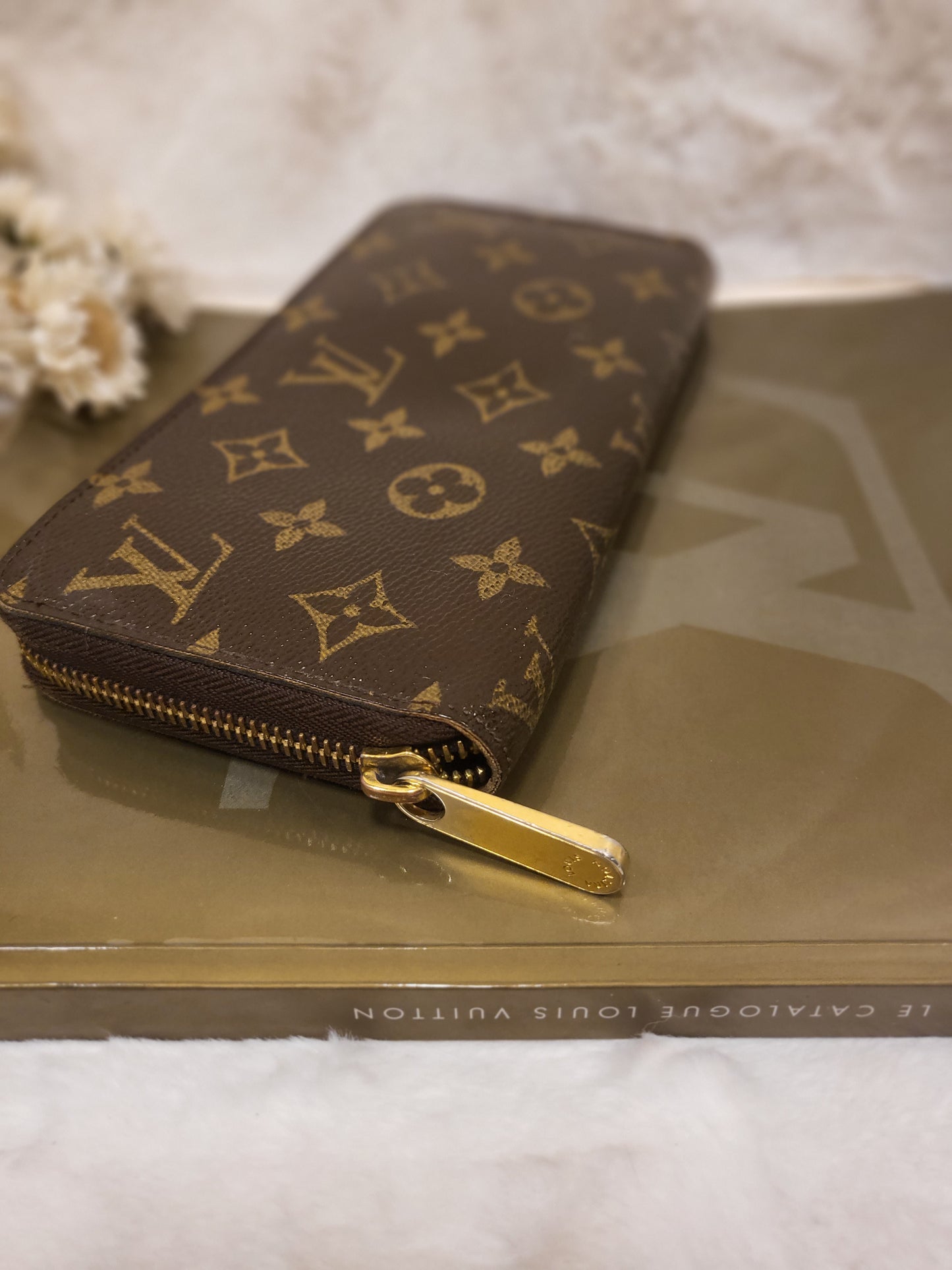 Authentic pre-owned Louis Vuitton Zippy wallet monogram