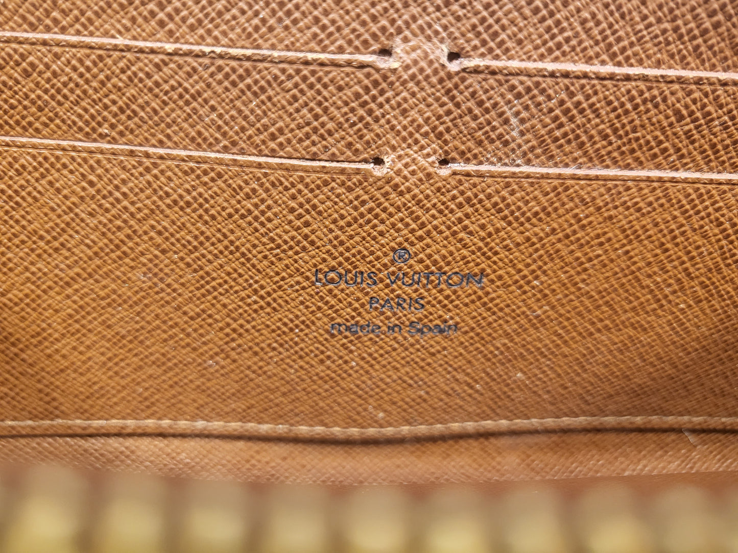 Authentic pre-owned Louis Vuitton Zippy wallet monogram