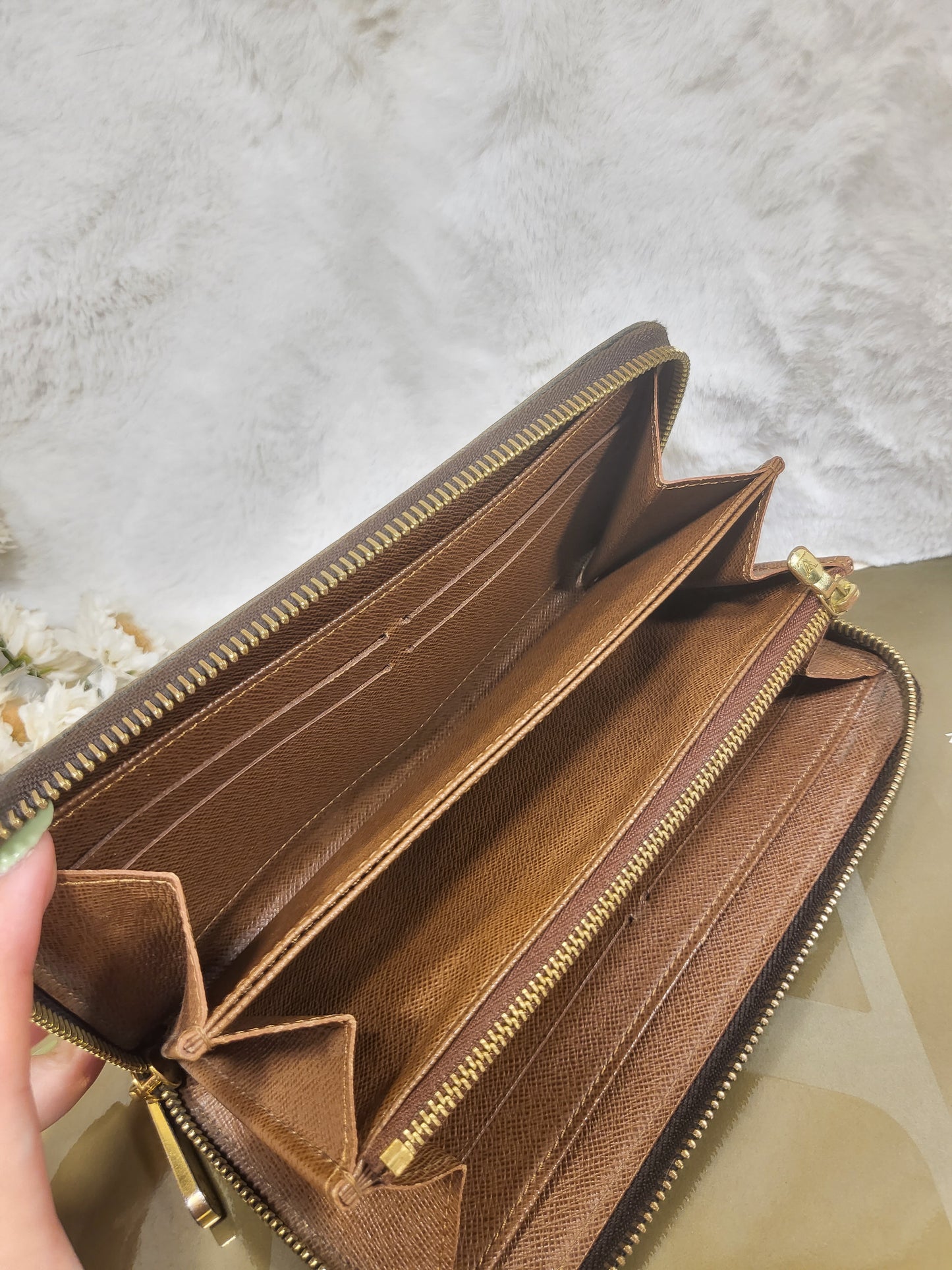 Authentic pre-owned Louis Vuitton Zippy wallet monogram