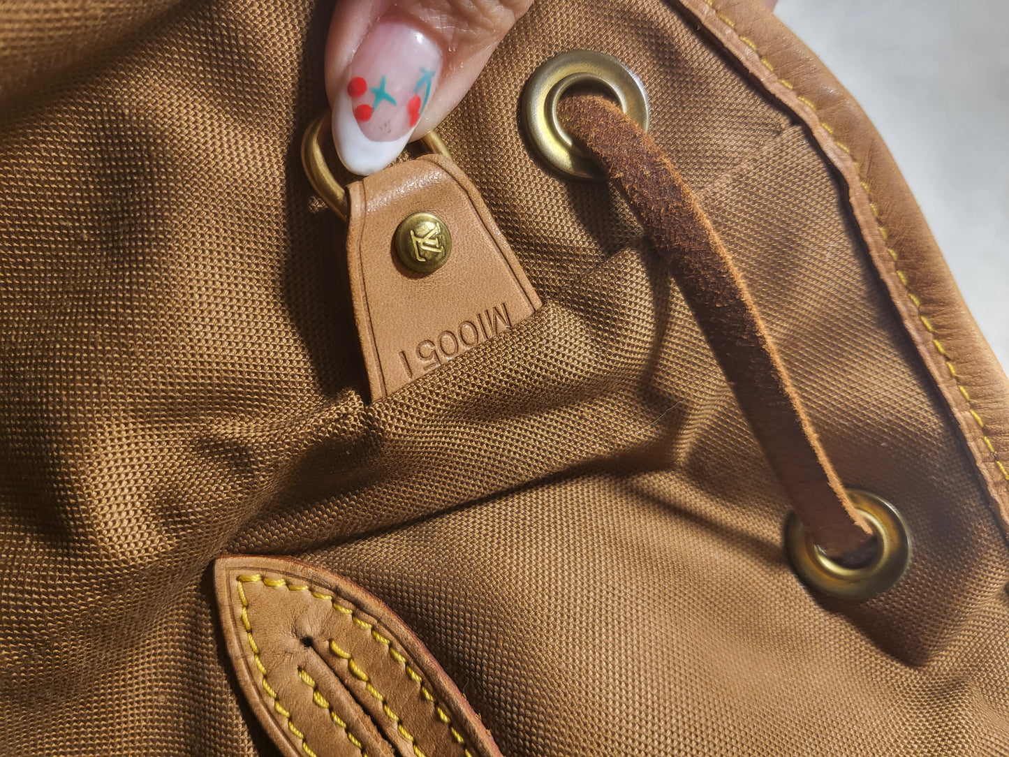 Authentic pre-owned Louis Vuitton Montsouris GM backpack