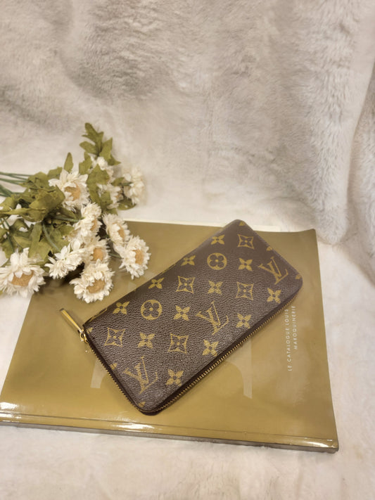 Authentic pre-owned Louis Vuitton monogram compact zippy wallet