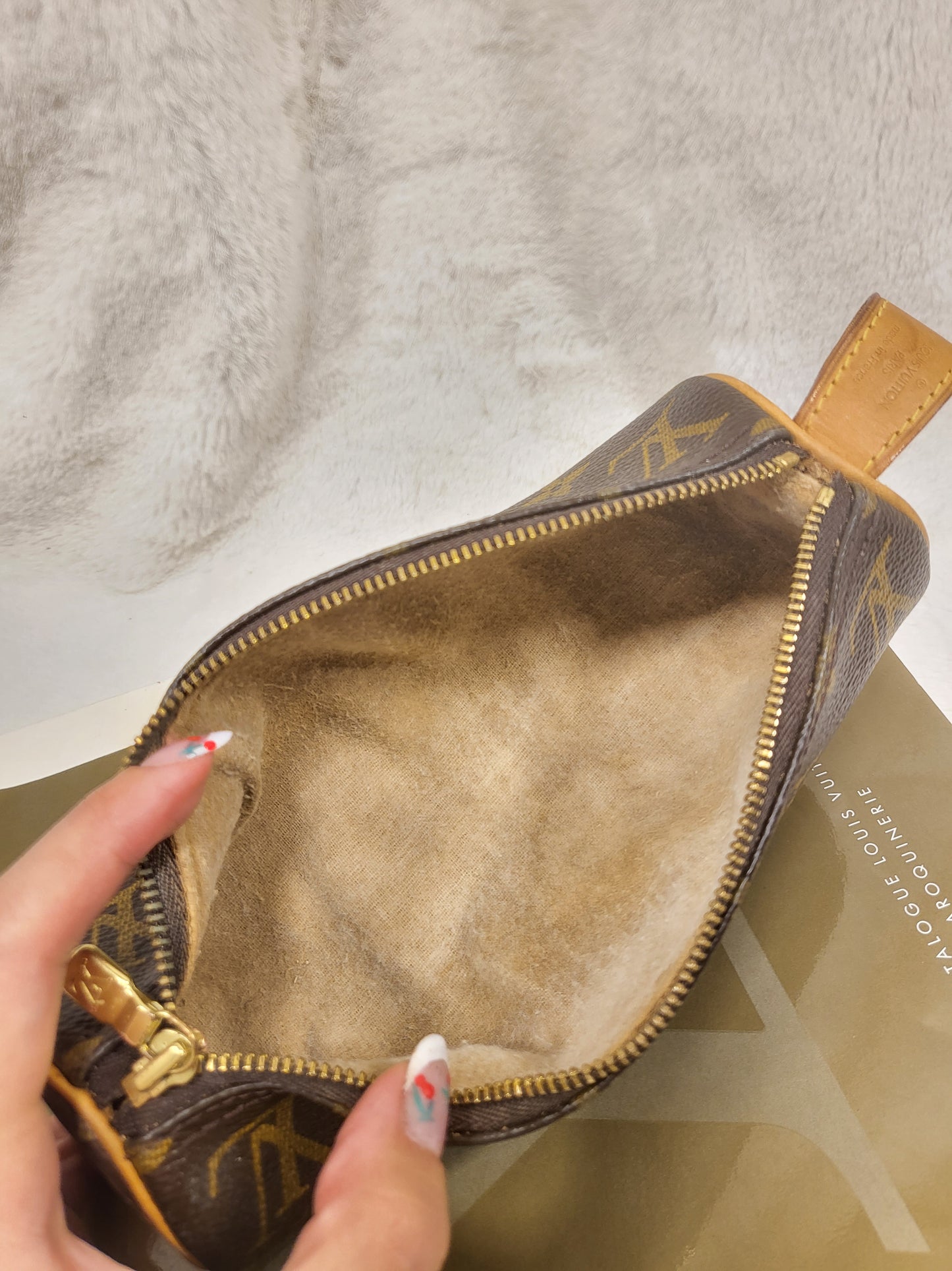 Authentic pre-owned Louis Vuitton Trousse Ronde makeup case