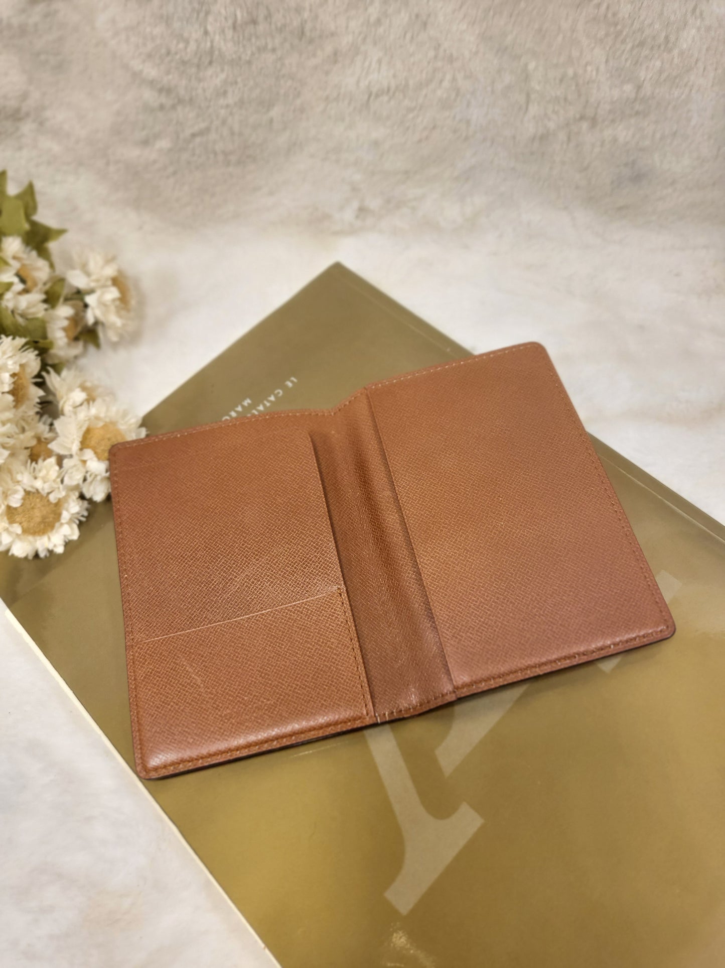 Authentic pre-owned Louis Vuitton passport holder