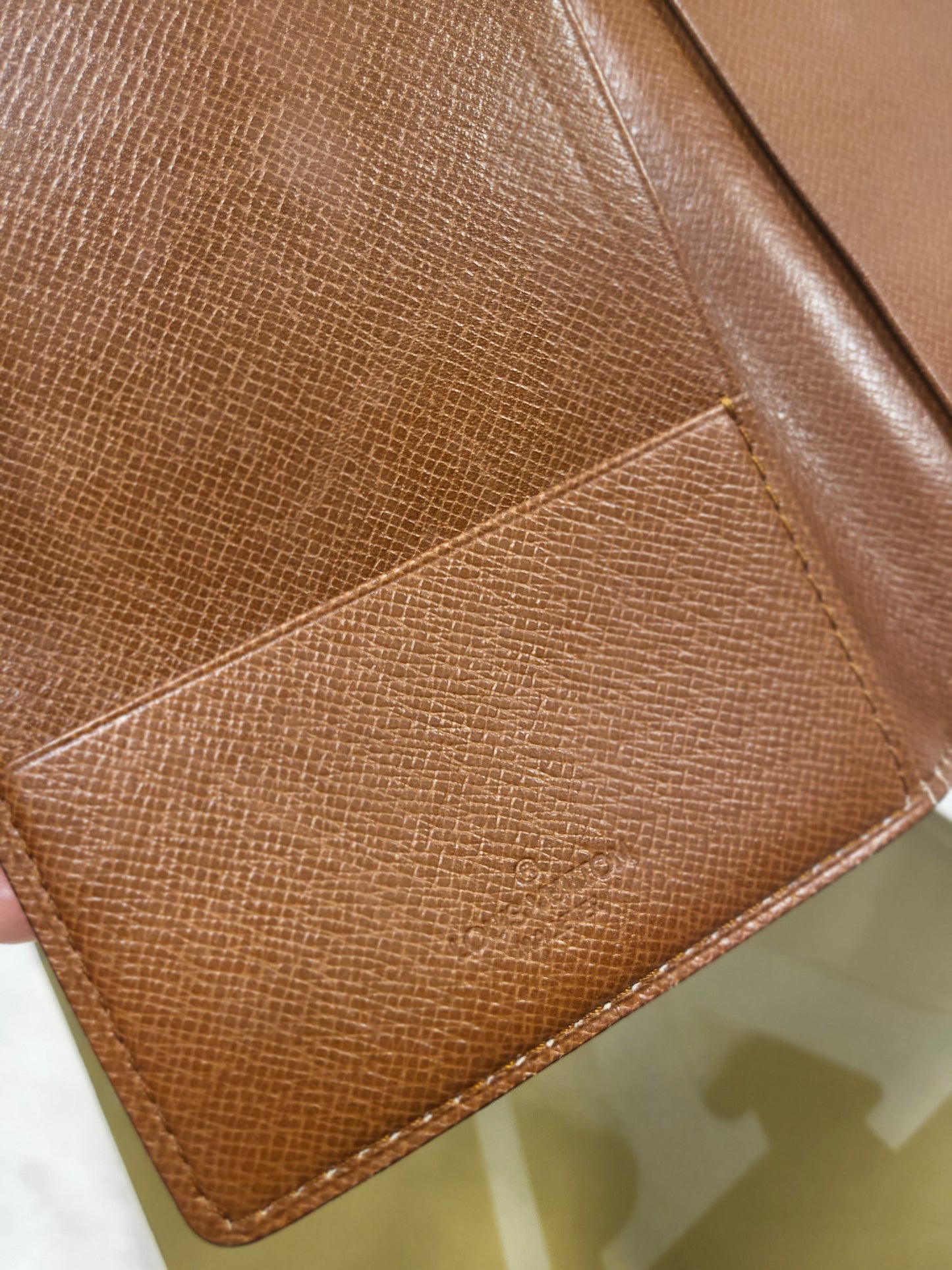 Authentic pre-owned Louis Vuitton passport holder