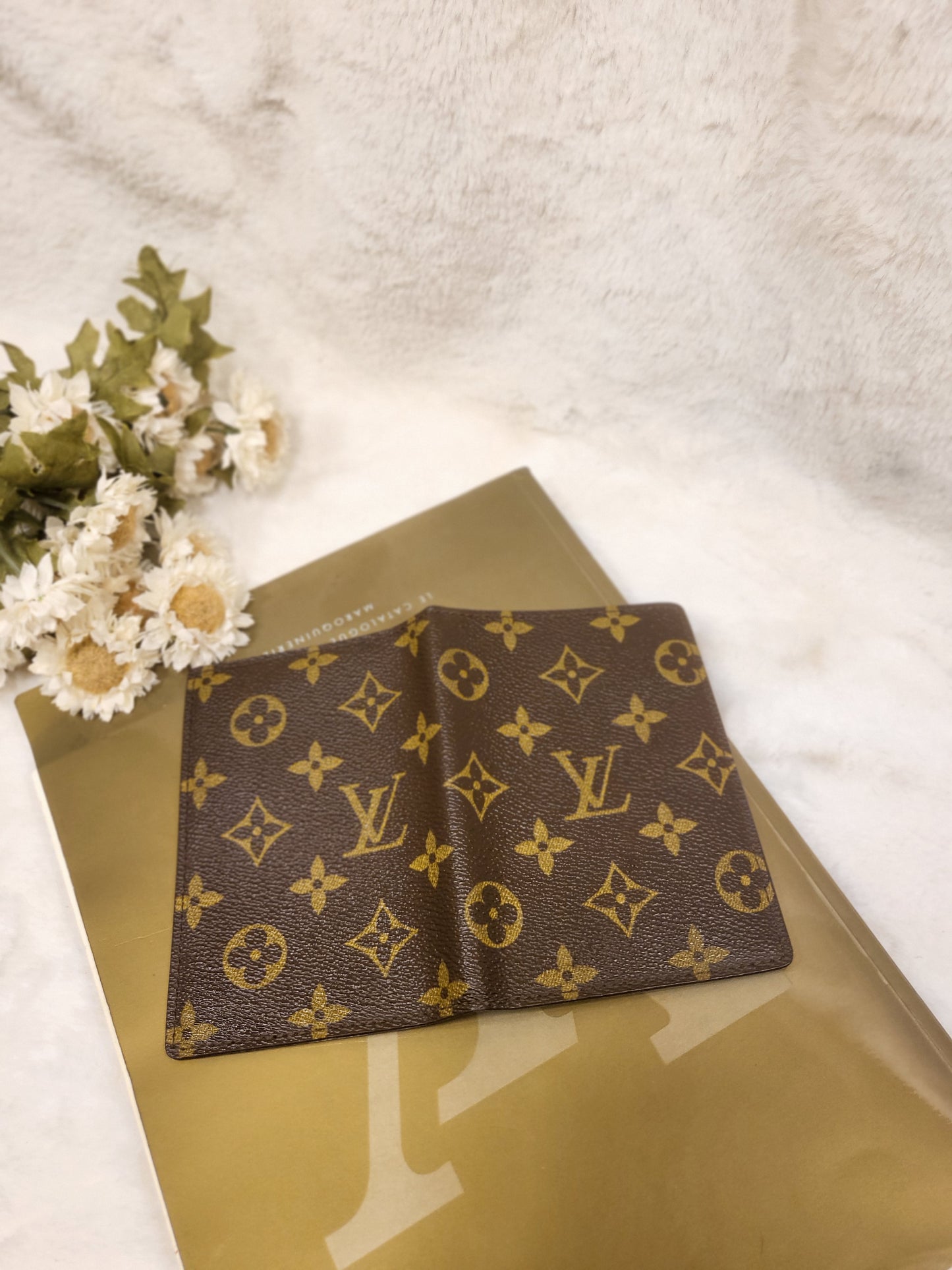 Authentic pre-owned Louis Vuitton passport holder