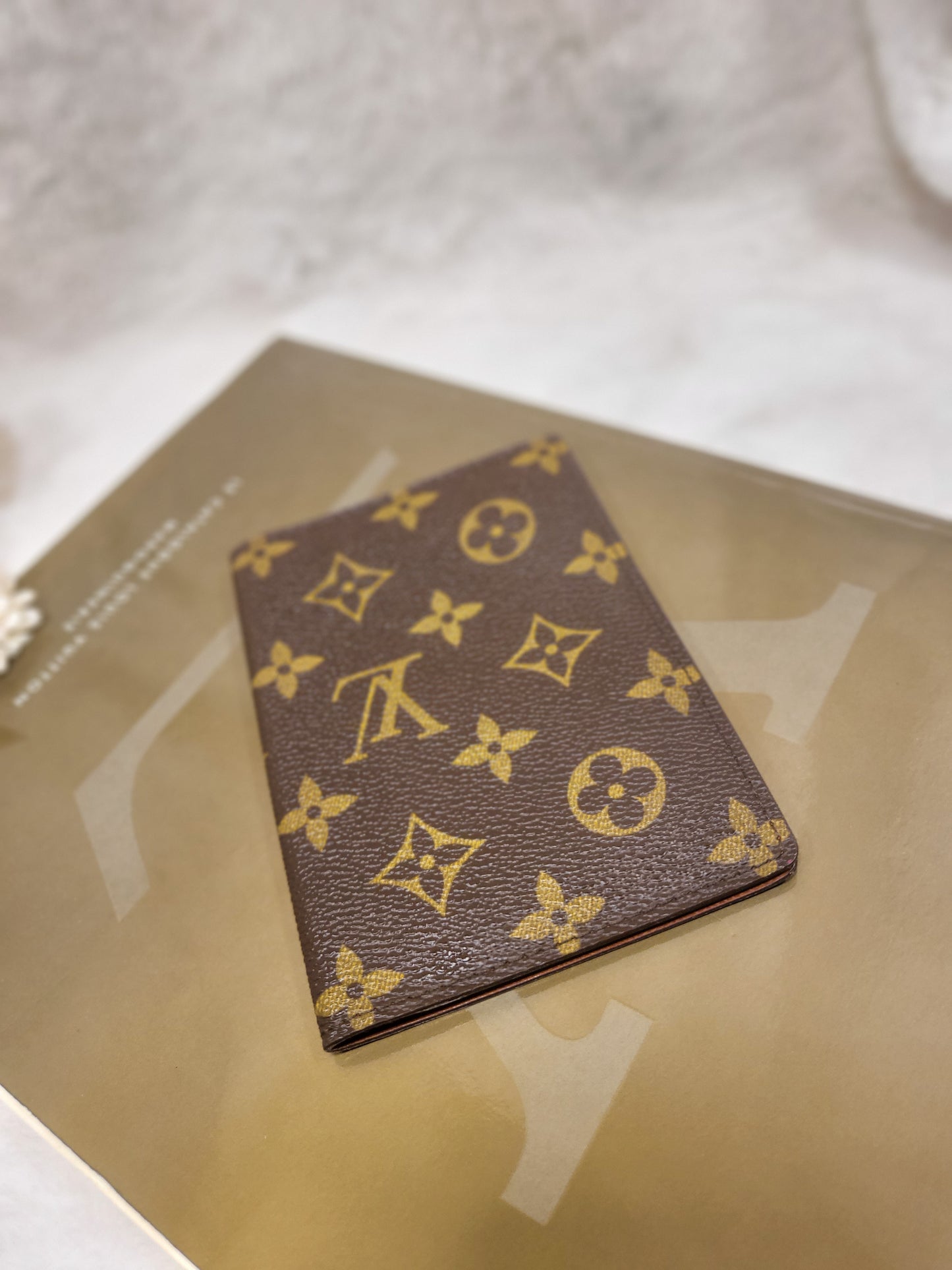Authentic pre-owned Louis Vuitton passport holder